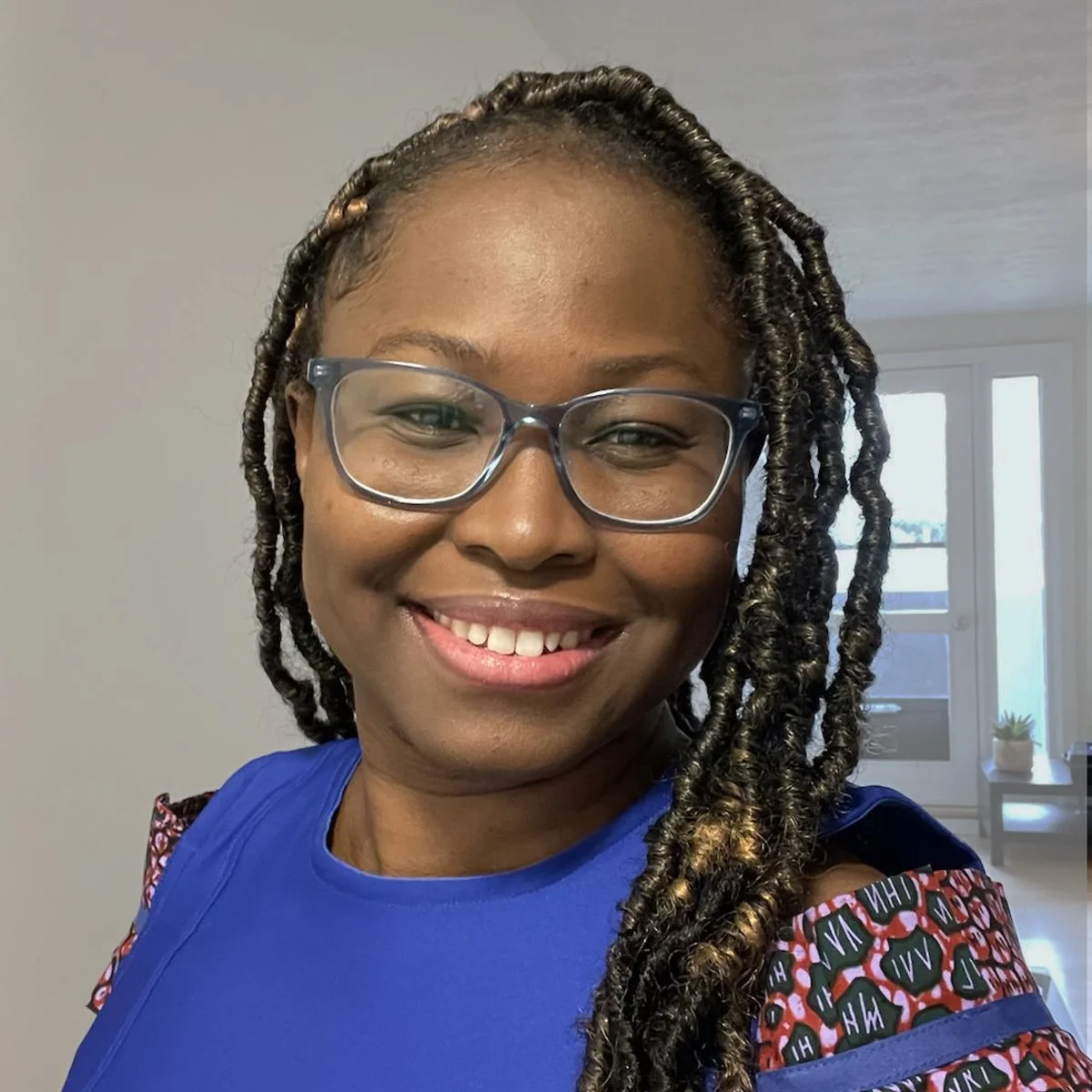 Headshot Ayande.Ruthfirst copy.jpg