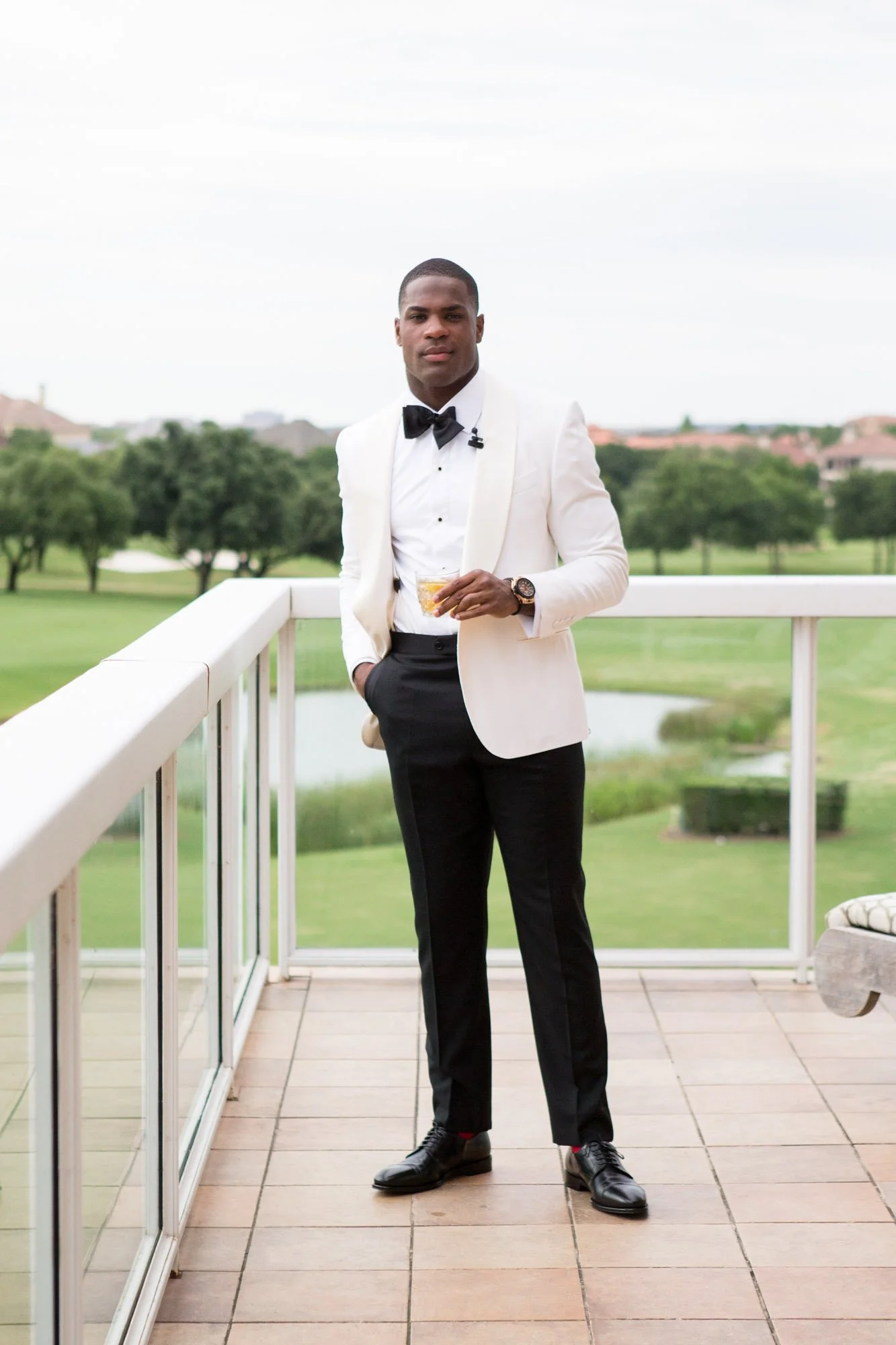groom-white-tux-ritz-carlton-dallas.jpg