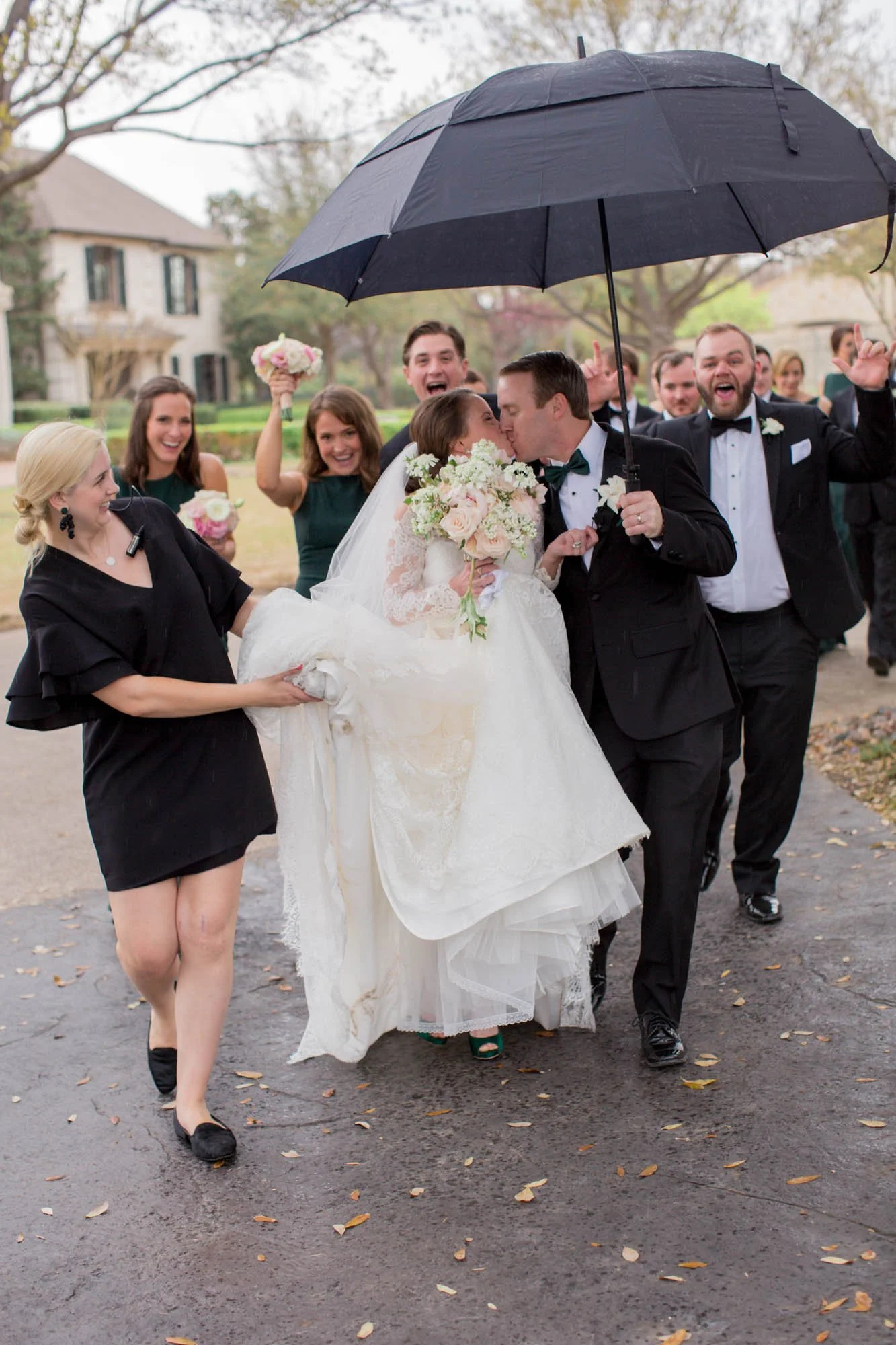 dallas-private-residence-wedding-umbrella-kiss.jpg