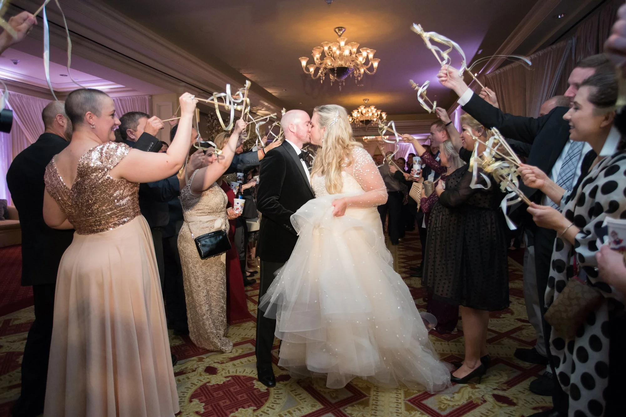 ritz-carlton-dallas-wedding-exit-kiss.jpg