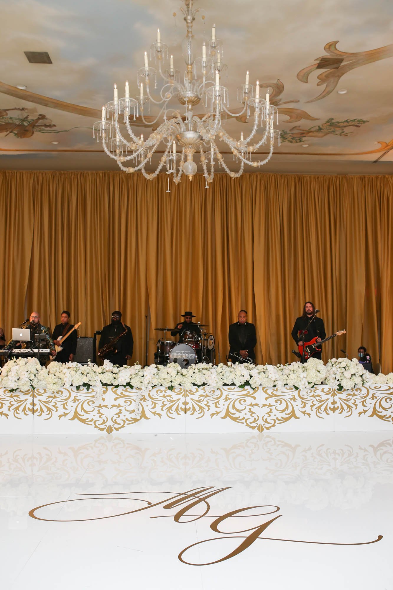 adolphus-wedding-stage-floral-and-dance-floor.jpg