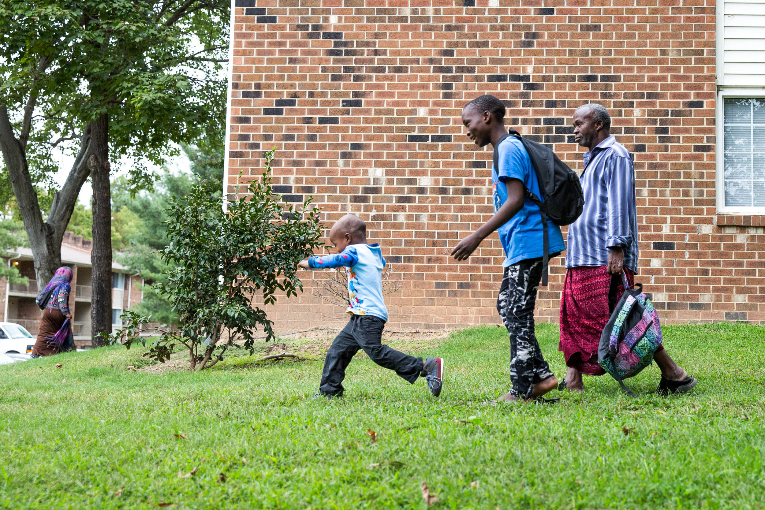 Fartune, Asimani, and Ali get dropped off from school. They haven't found anybody who speaks Swahili, so making friends has been difficult.