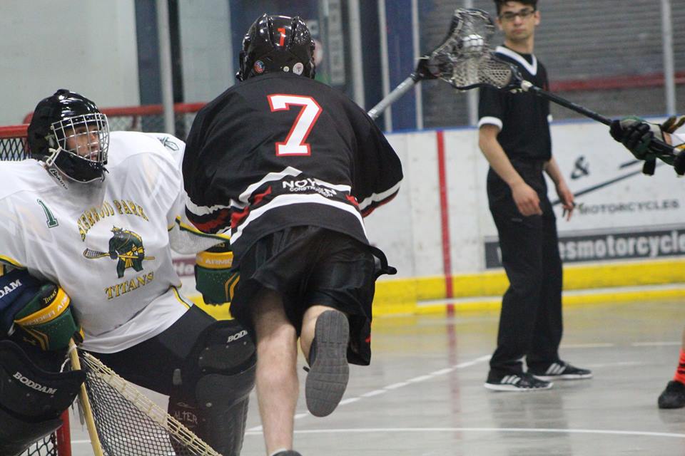 Jack Snider dives across the crease. Photo Courtesy of Janelle Jaksitz