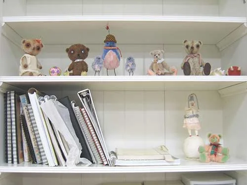 Ikea shelf teddies sketchbooks