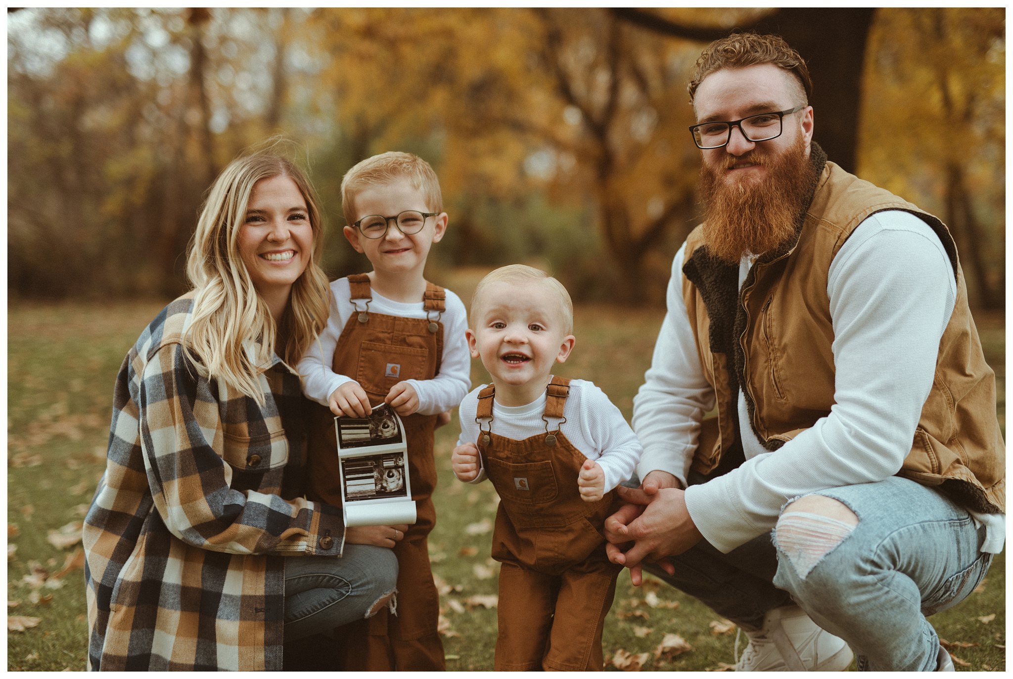 Black Family Fall Family Session and Pregnancy Announcement in Boise, ID at Idaho Fallen Firefighters Memorial Park