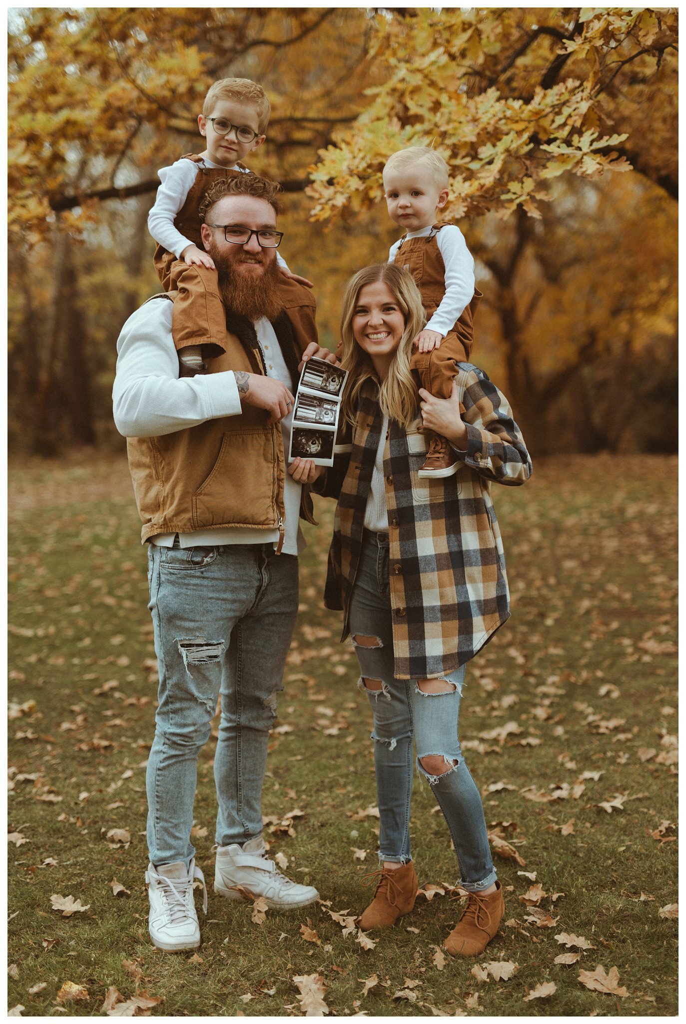 Black Family Fall Family Session and Pregnancy Announcement in Boise, ID at Idaho Fallen Firefighters Memorial Park