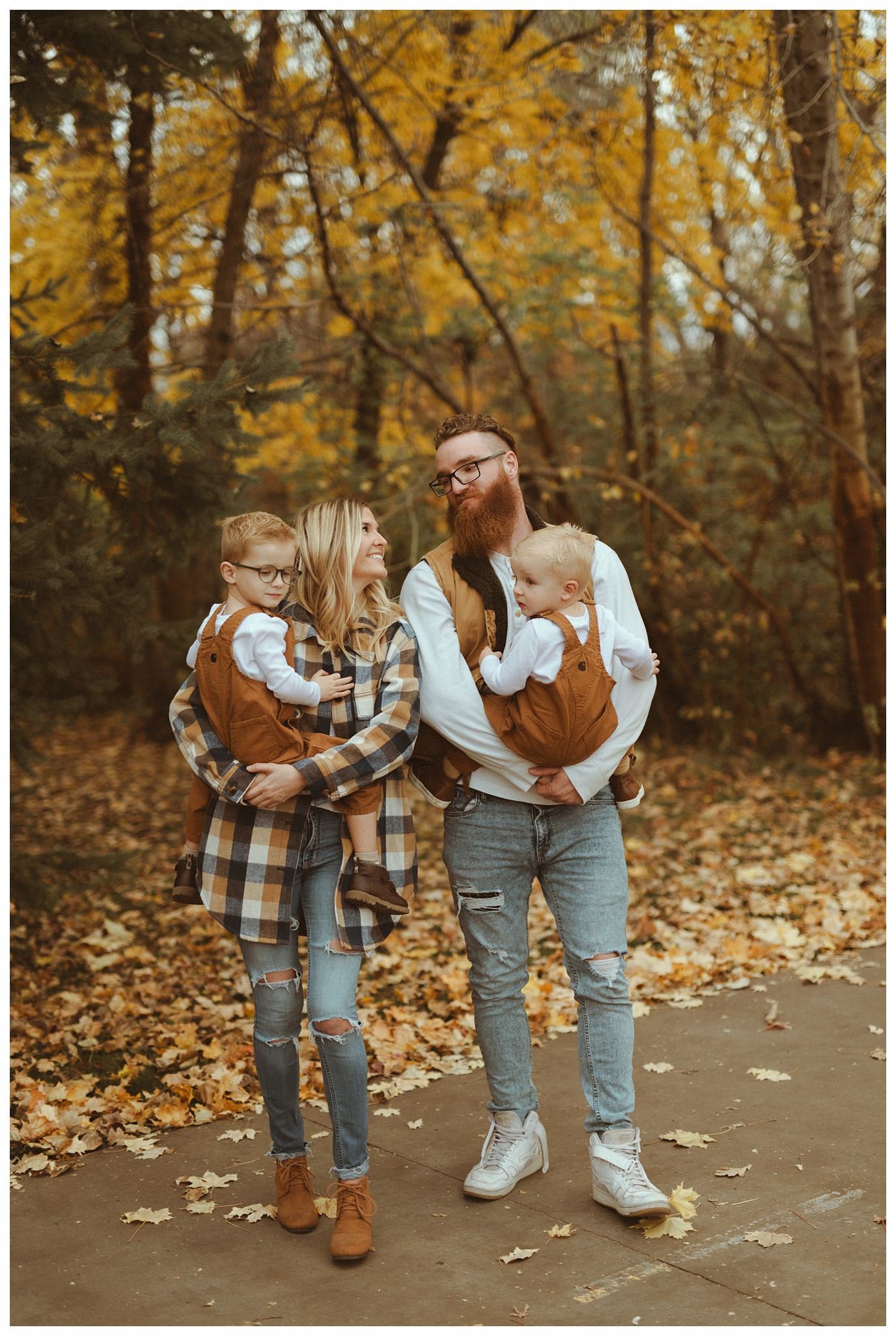 Black Family Fall Family Session and Pregnancy Announcement in Boise, ID at Idaho Fallen Firefighters Memorial Park