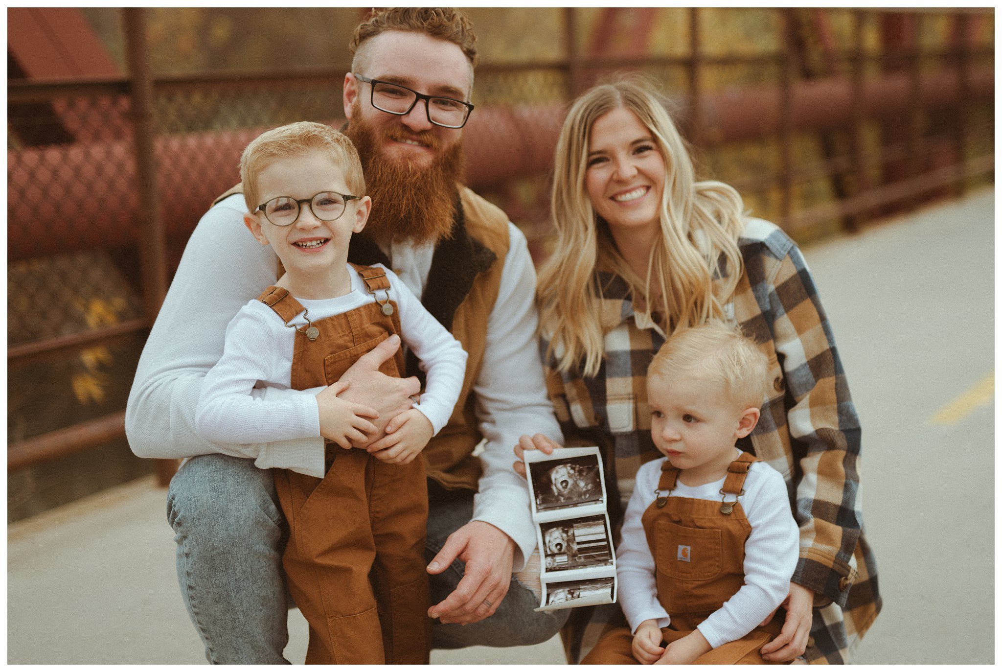 Black Family Fall Family Session and Pregnancy Announcement in Boise, ID at Idaho Fallen Firefighters Memorial Park