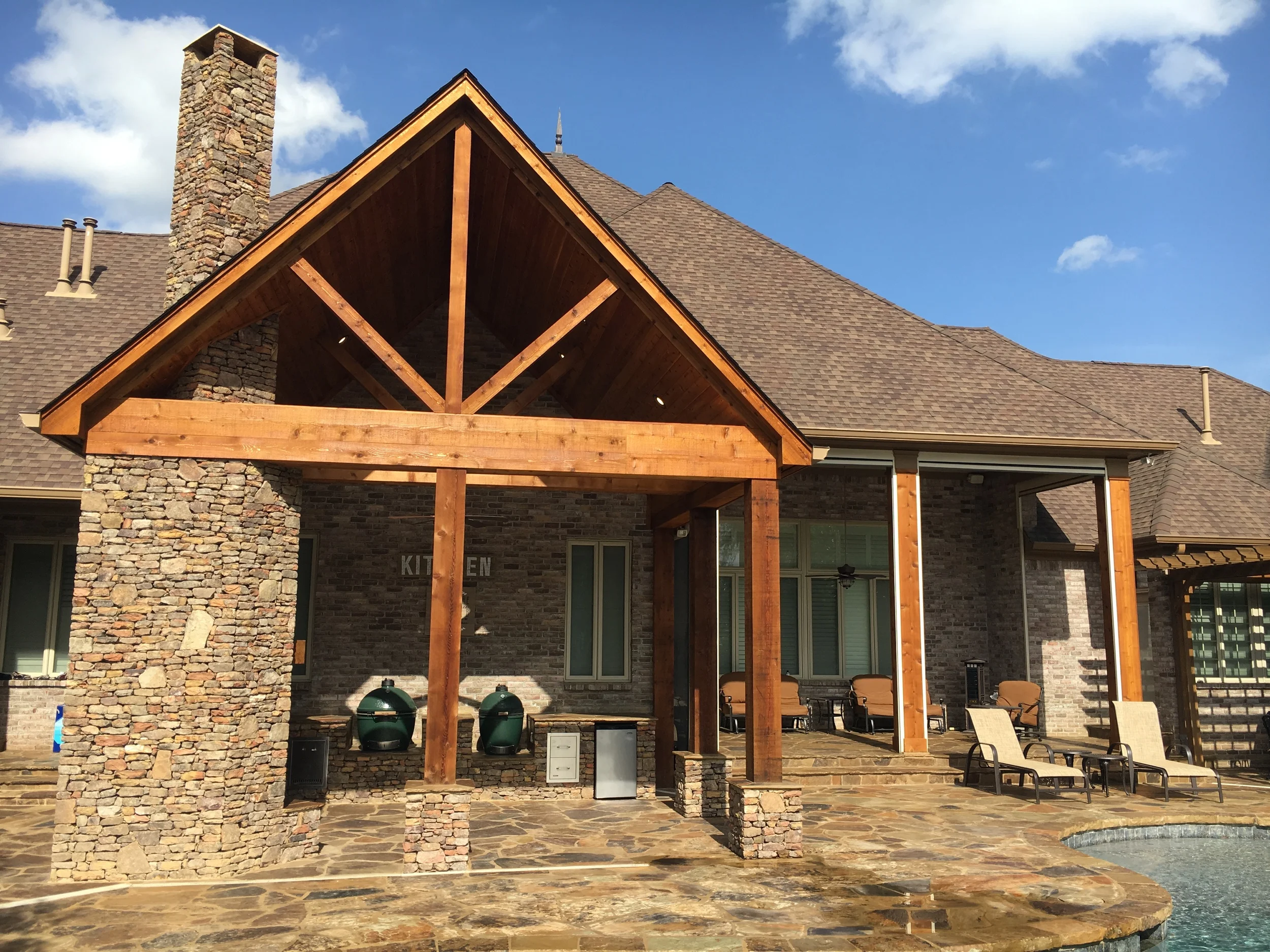 OUTDOOR LIVING Whether your dream is an outdoor kitchen, pool deck, or fireplace, our goal is for you to feel like you are on vacation each time you step out the back door. 