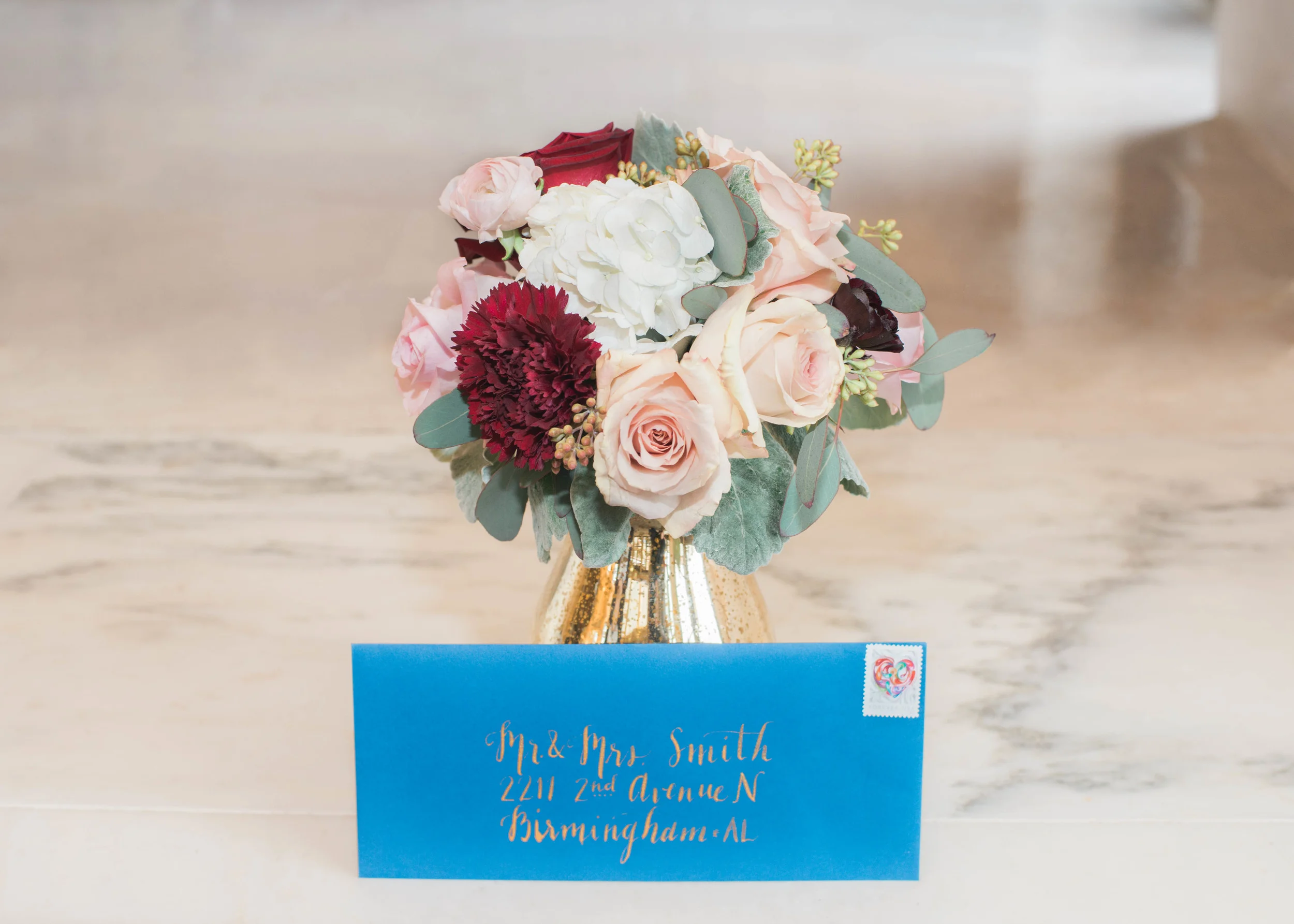 Florals by: Sarah Woodall of Gold Leaf Floral Calligraphy by: Ginger Swan of Swan Lindsey Lettering
