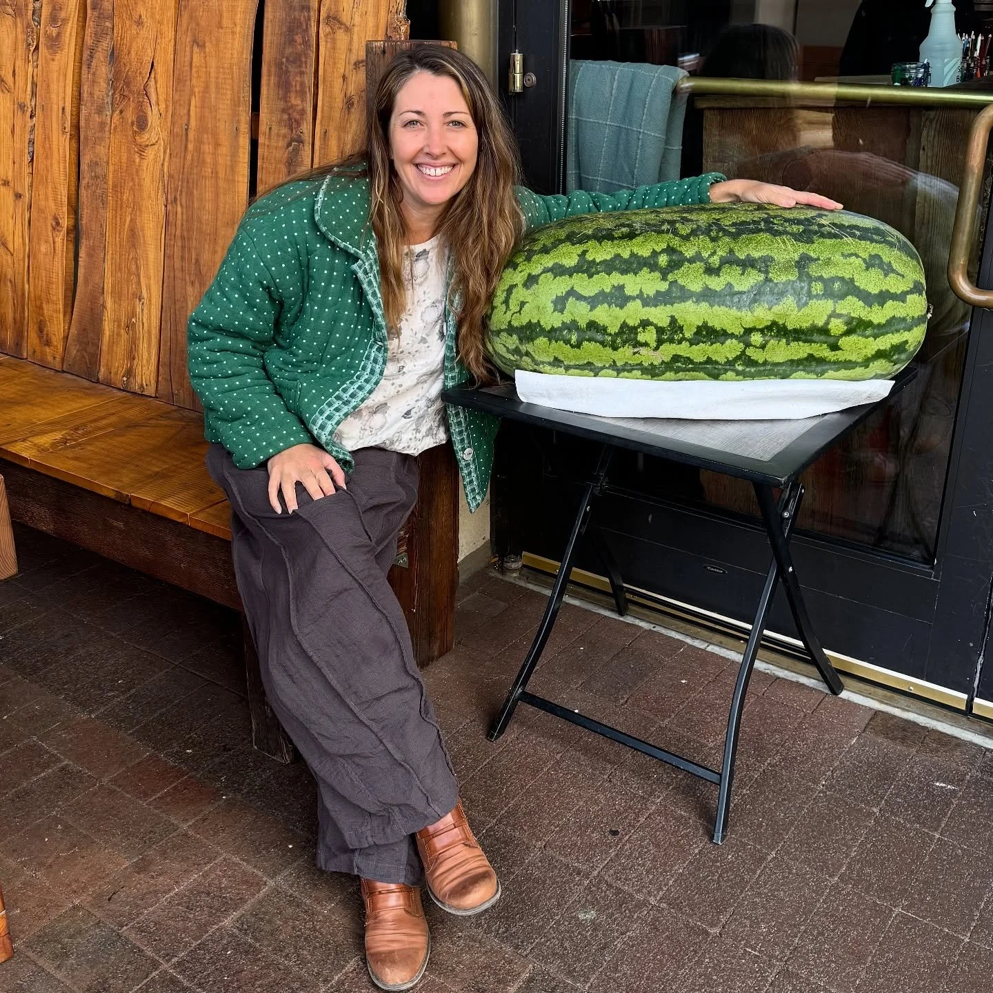 Jen and the GIANT watermelon 🍉 Big things are happening here at Taproot! Giant pumpkin, Giant Watermelon, Fall Menu Release @taproot_cider_house @mynorthmedia @puremichigan @traversecitytourism #giantwatermelon #giantpumpkin #fallvibes