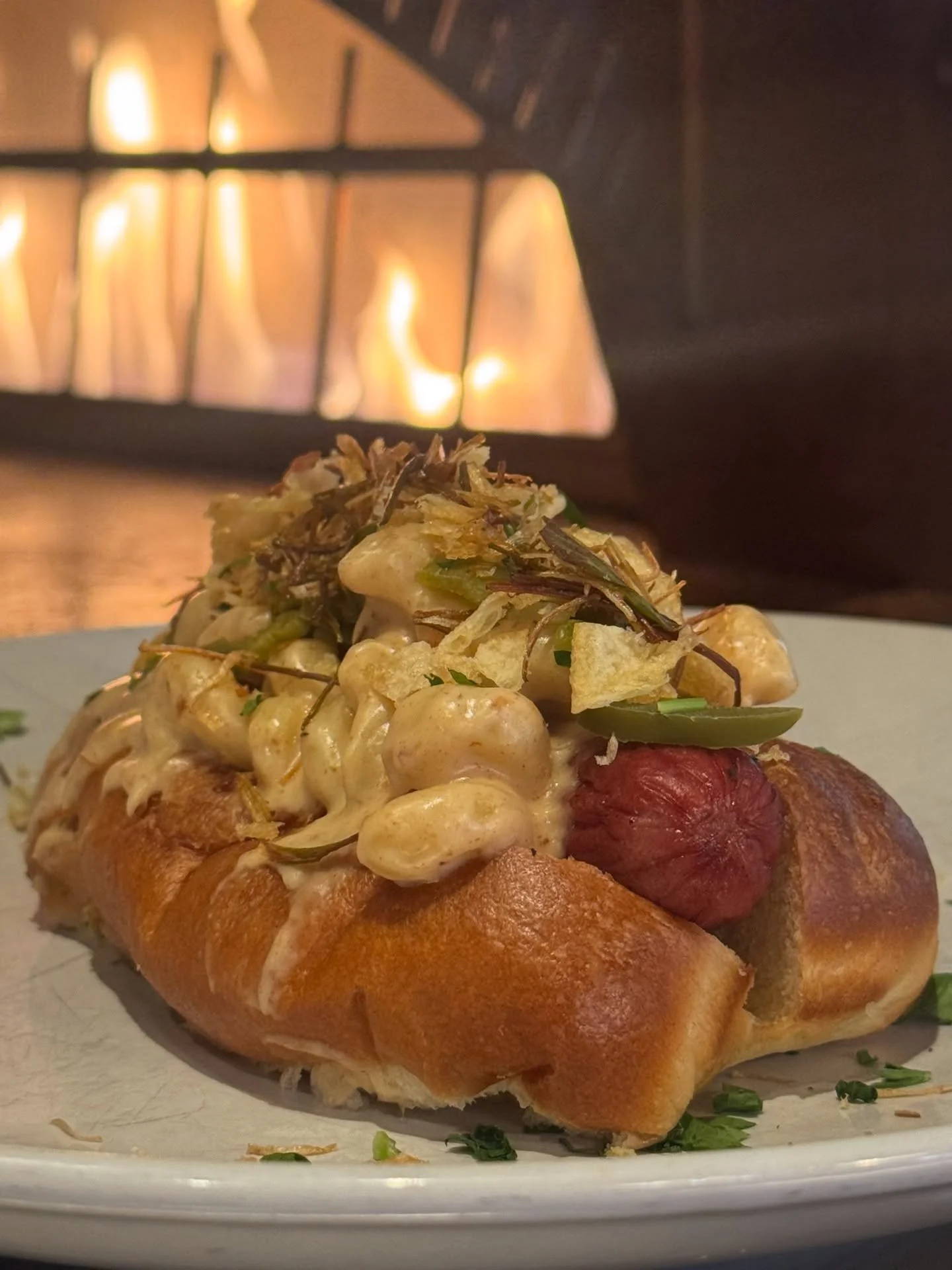 Hot Dawg 🔥 Featuring a Mac n Cheese Hot Dog and Birria Enchiladas. Taken away with every mind blowing bite, WOW, you have to come try these. Paired nicely with the Clear Conscience @taproot_cider_house #hotdog #enchiladas #ciderhouse @northernexpres