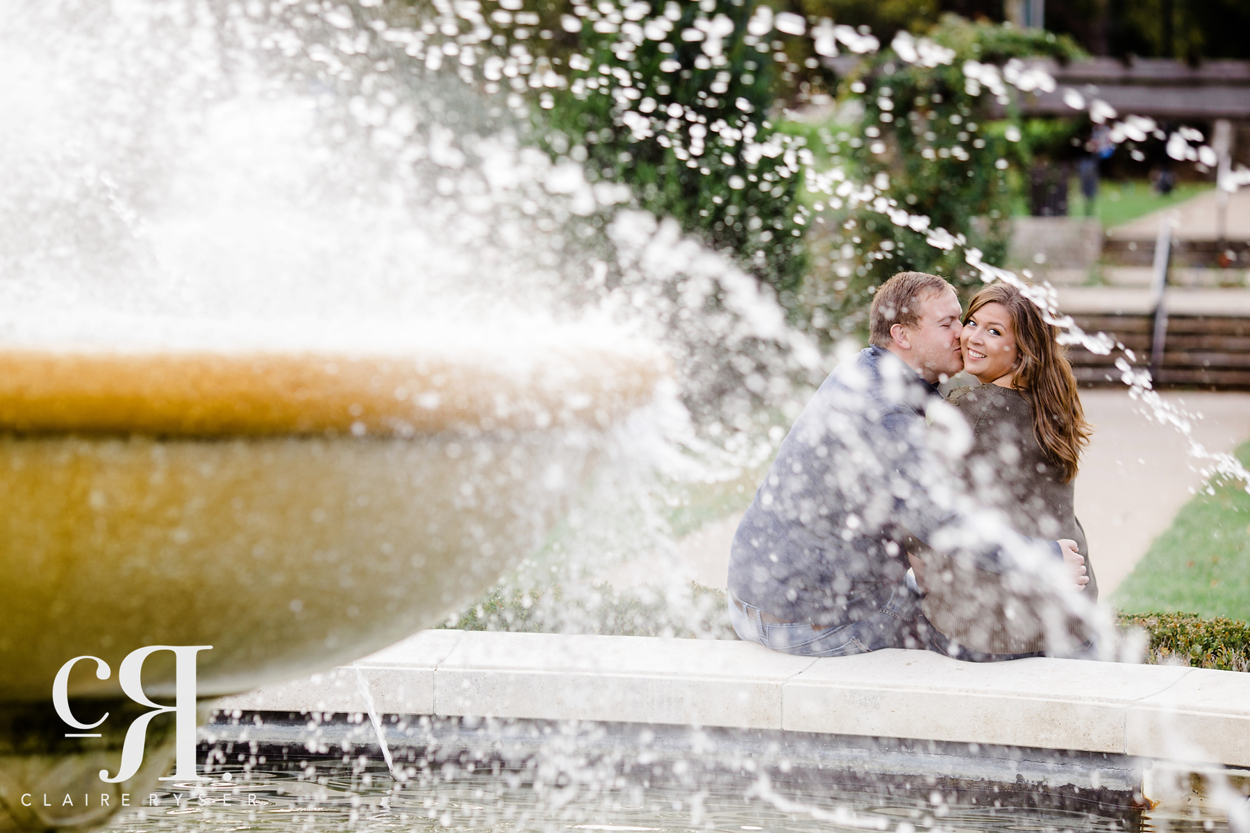 Engagement Photos Through Fountain