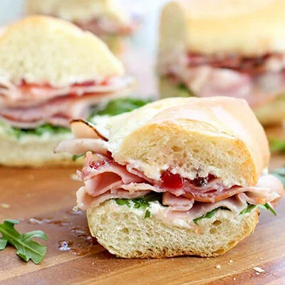 HAM off the bone , swiss cheese, rocket, mustard &amp; pickles   from  $8,-