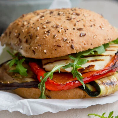 GRILLED HALOUMI , zucchini, roast peppers &amp; tzatziki   from  $8,-