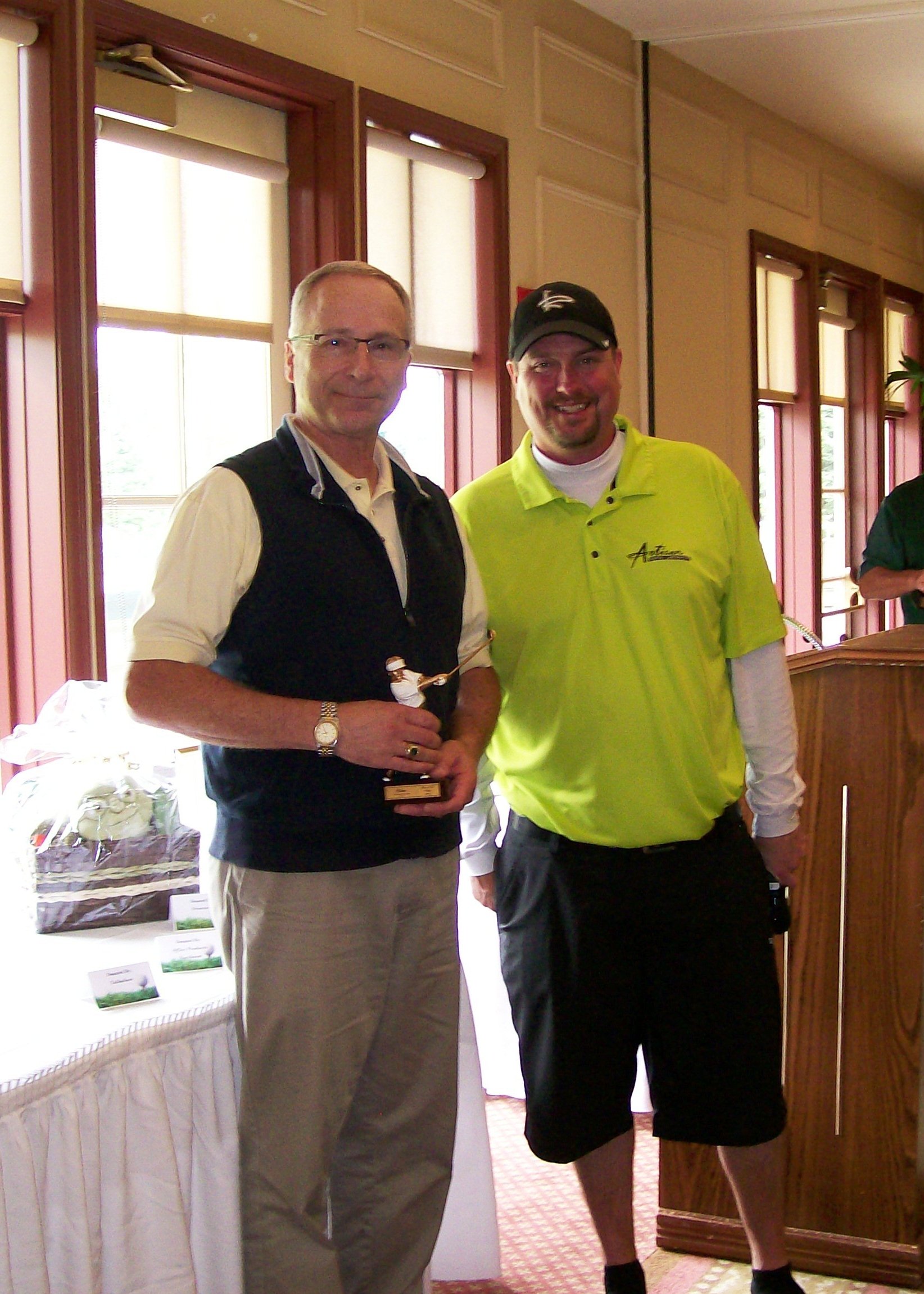 Longest Putt Contest Winner Ed Ulmer with Justan Koch.JPG