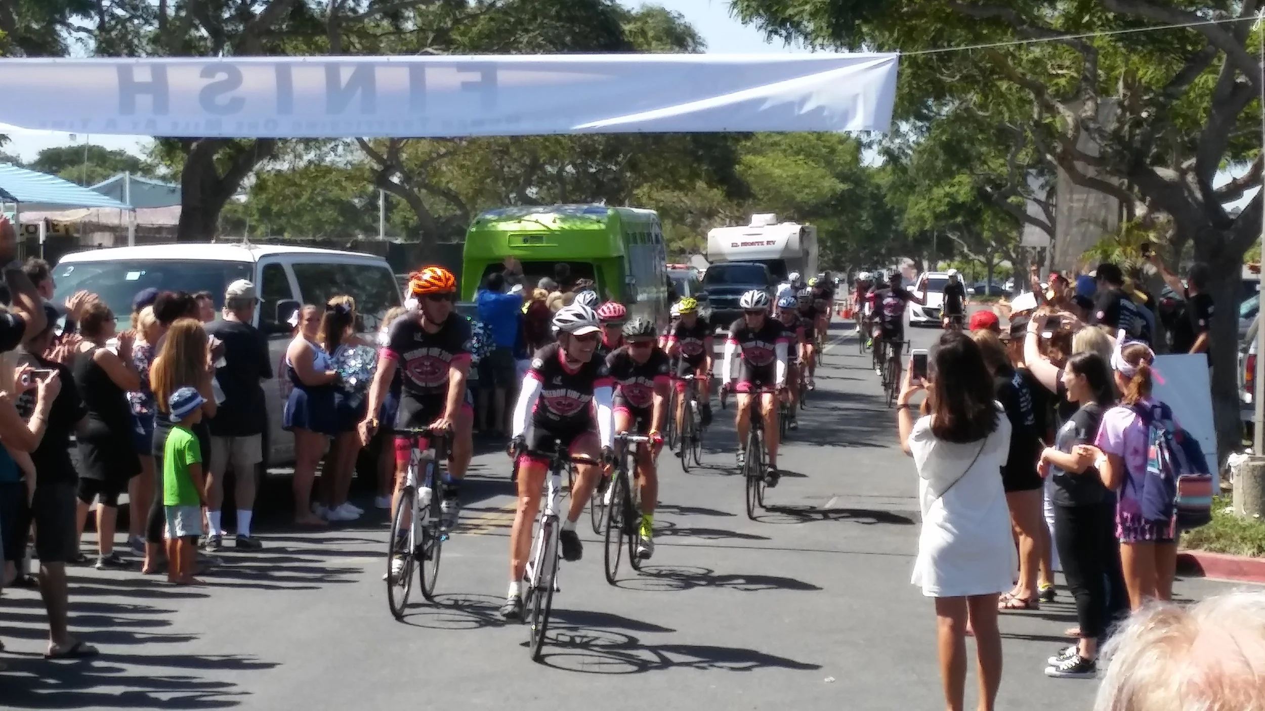 After a 15-day bike ride, the cyclists reach the Freedom Ride finish line.