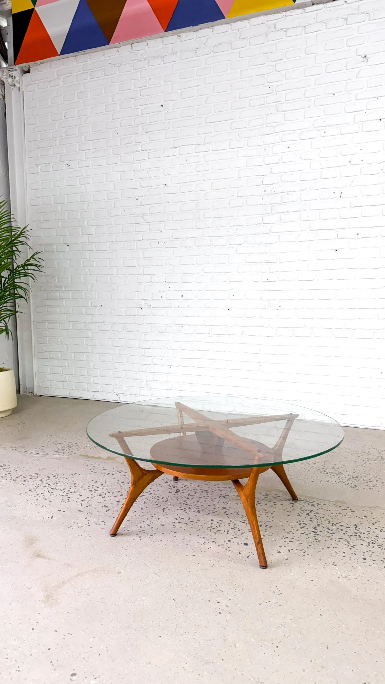 Scupted wood and glass mid century round coffee table3.jpg