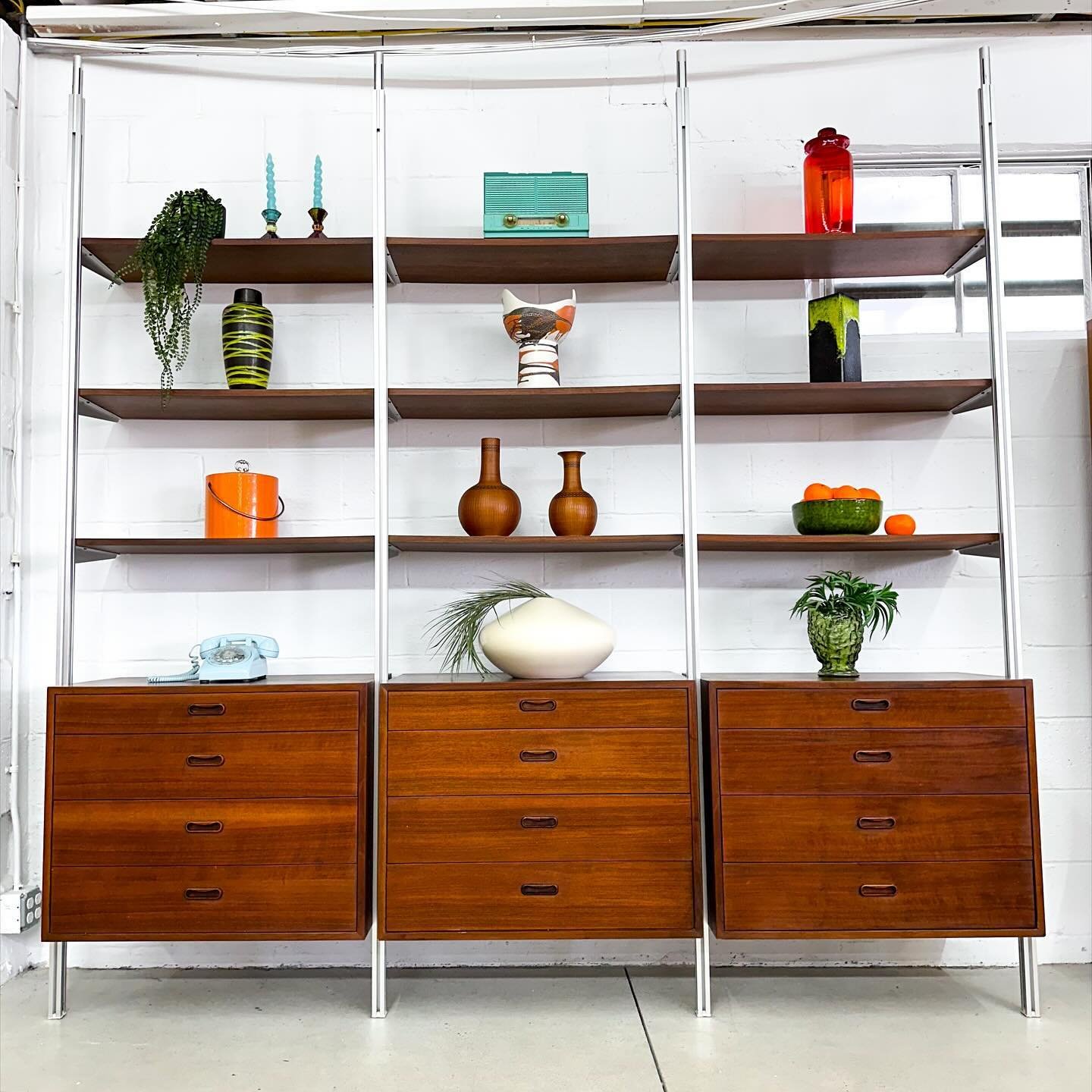 The OMNI wall unit system, designed by George Nelson in the 1950s. It truly is a beautiful system. Everything is adjustable, interchangeable, and customizable.

This came out of a Manhattan apartment from the original owners, who had a MASSIVE eleven