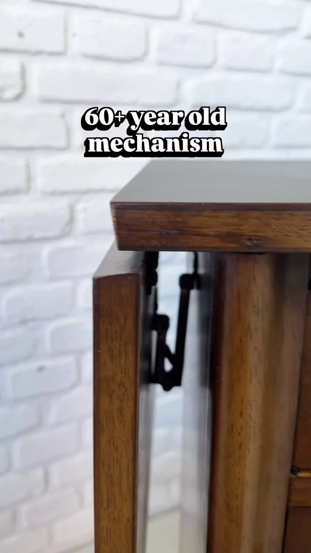 I love the satisfying mechanism on this Broyhill bar cart from the 1960s.