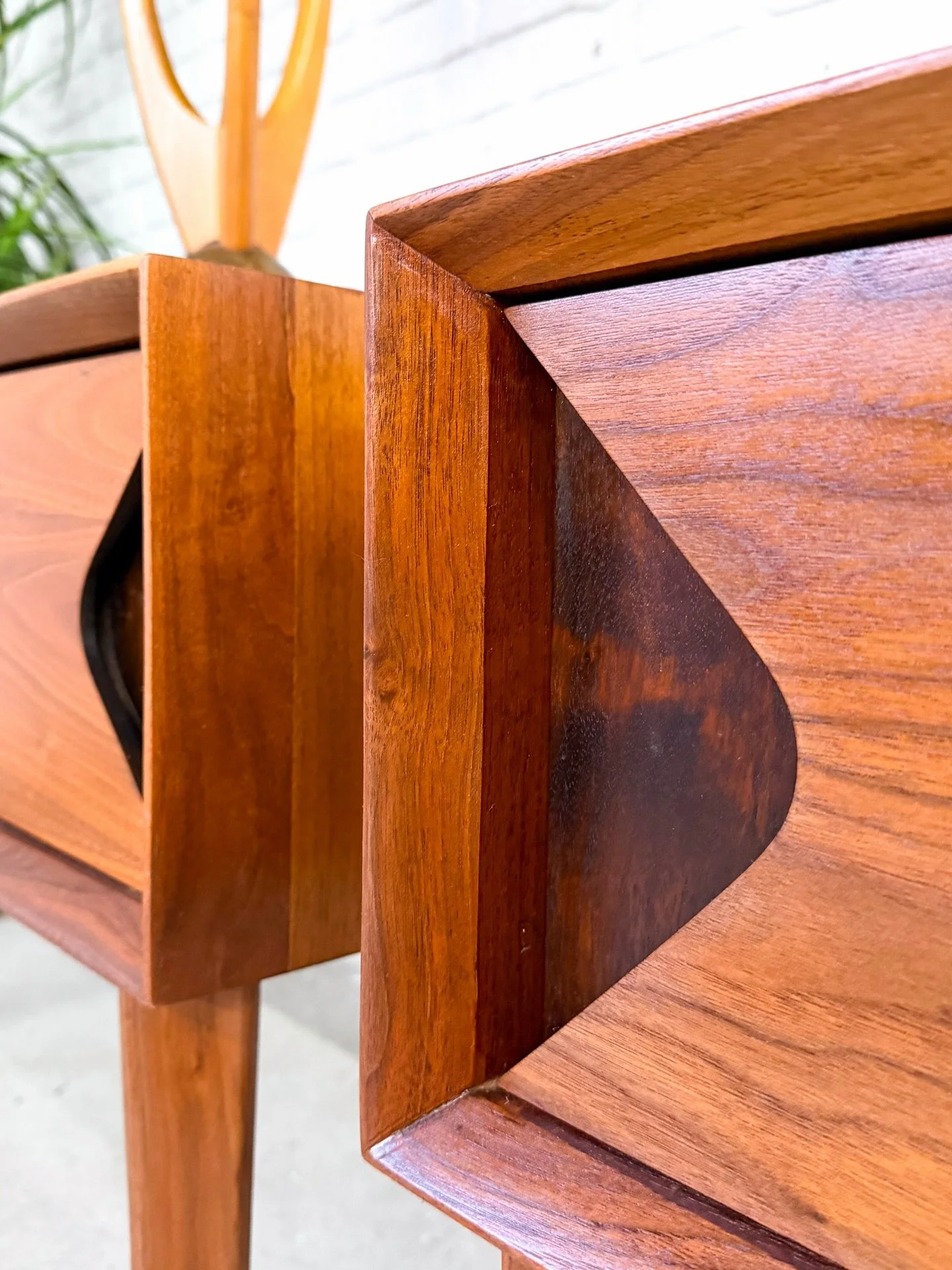 Rare, top notch quality walnut nightstands by Marc Berge for Grosfeld House, circa 1959.

From design to execution to materials, these pieces are among the highest quality out there. 

They are fairly large for nightstands, and the single drawers are