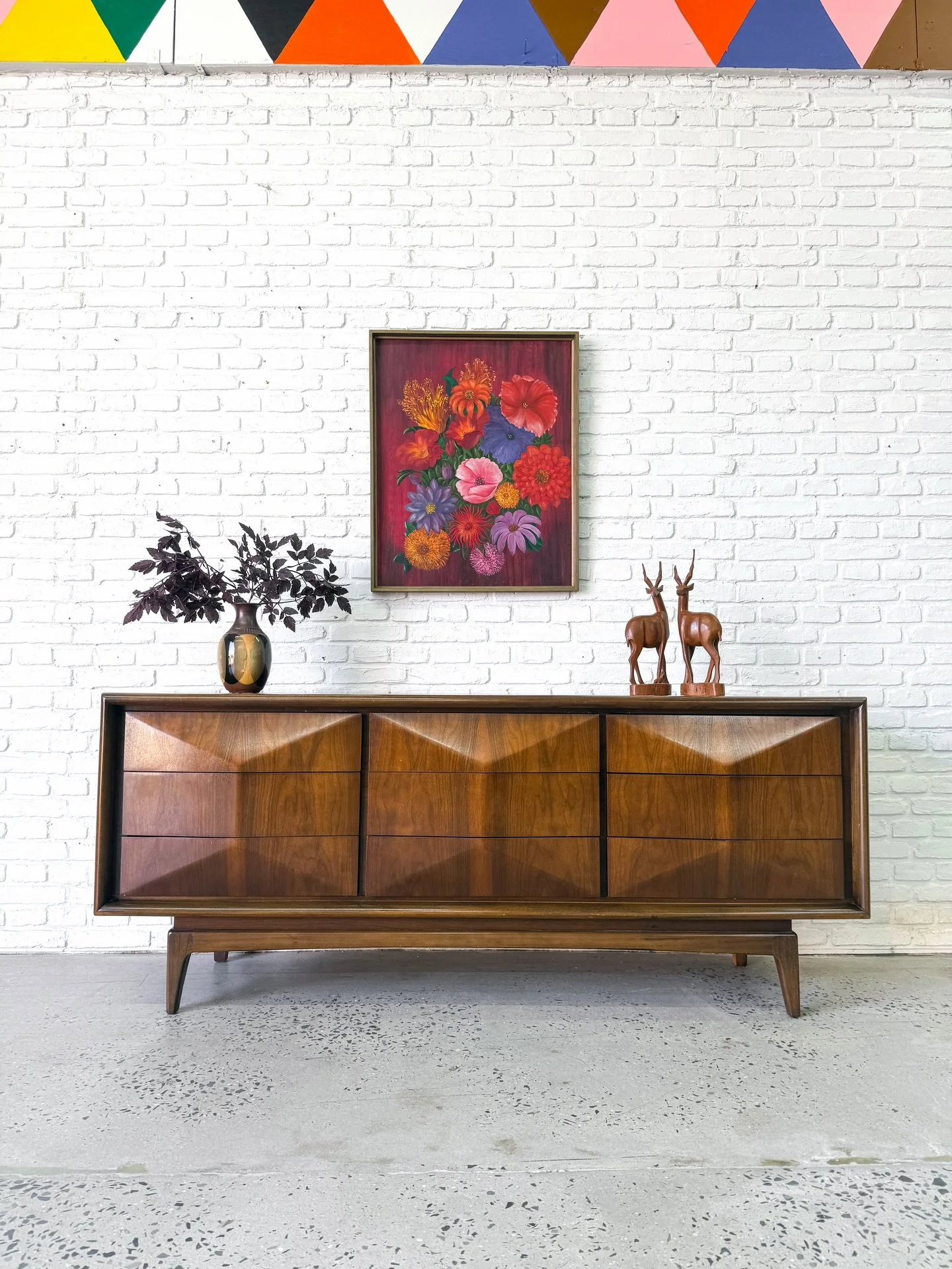 🔥 Diamond front lowboy dresser by United Furniture, circa 1960s. 🔥 

A classic mid century design: simple and interesting. Nine large solid wood drawers, with a strong walnut and elm case. 

In good original condition. 

74&rdquo; x 19&rdquo; x 30.