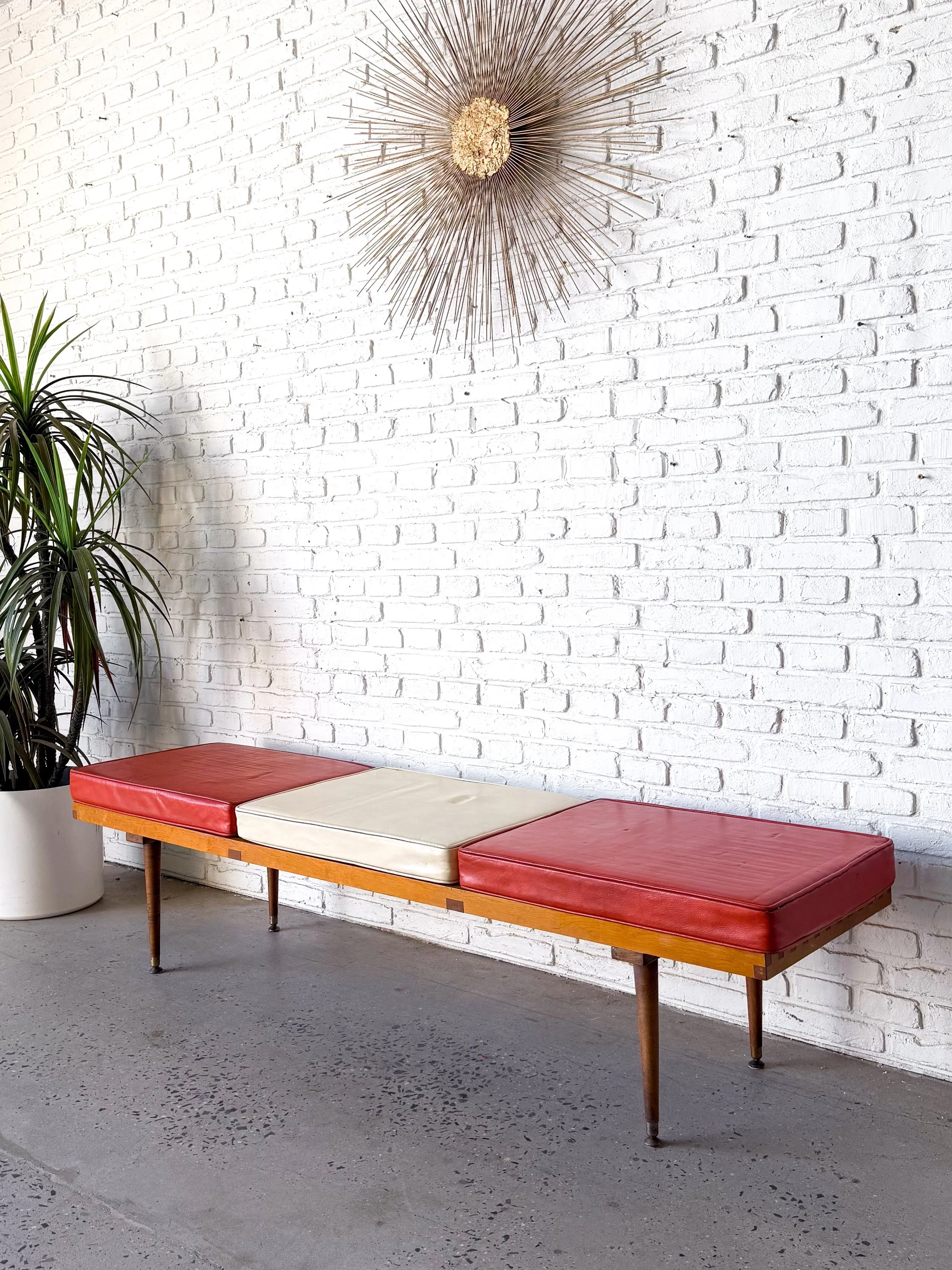 Great vintage slat bench with three LEATHER cushions. Cushions have a little wear to them but no tears. Use them all, use some, or use none. A classic mid century look. 

74&rdquo; w x 19&rdquo; d x 18.25&rdquo; tall w/ cushions (15&rdquo; w/o)

$100