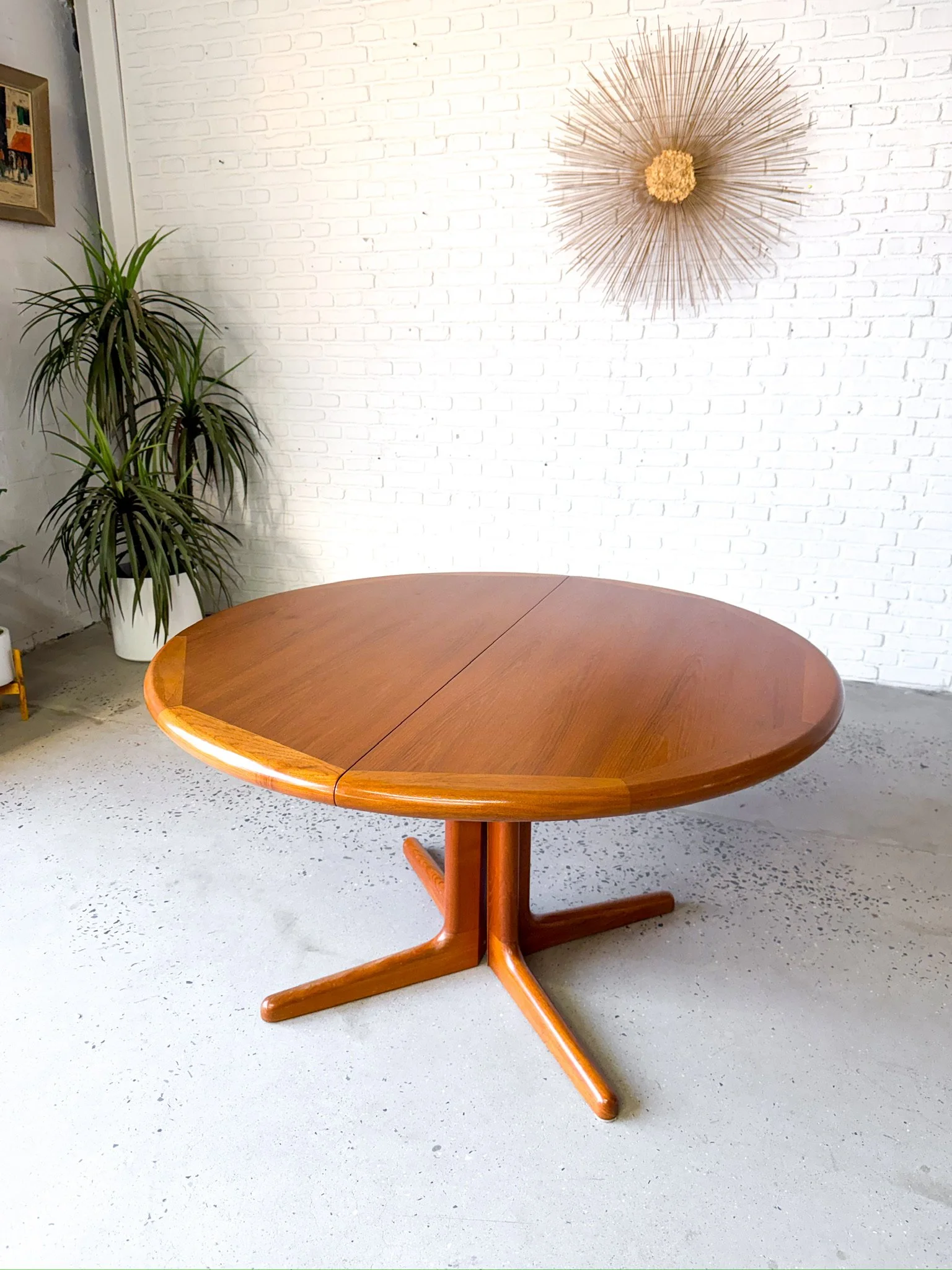 Danish teak circular dining table with two large leaves1.jpg