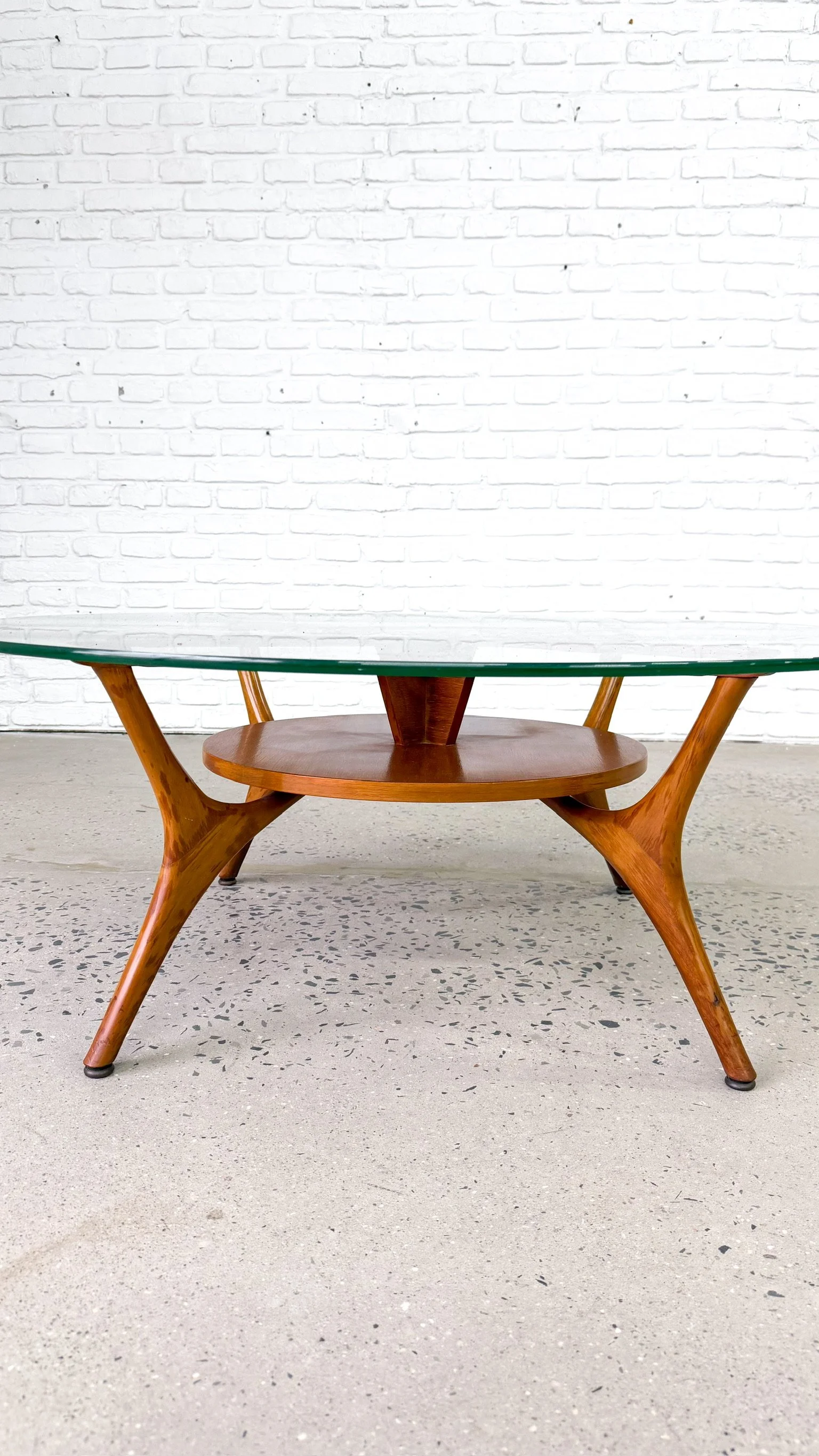 Scupted wood and glass mid century round coffee table8.jpg