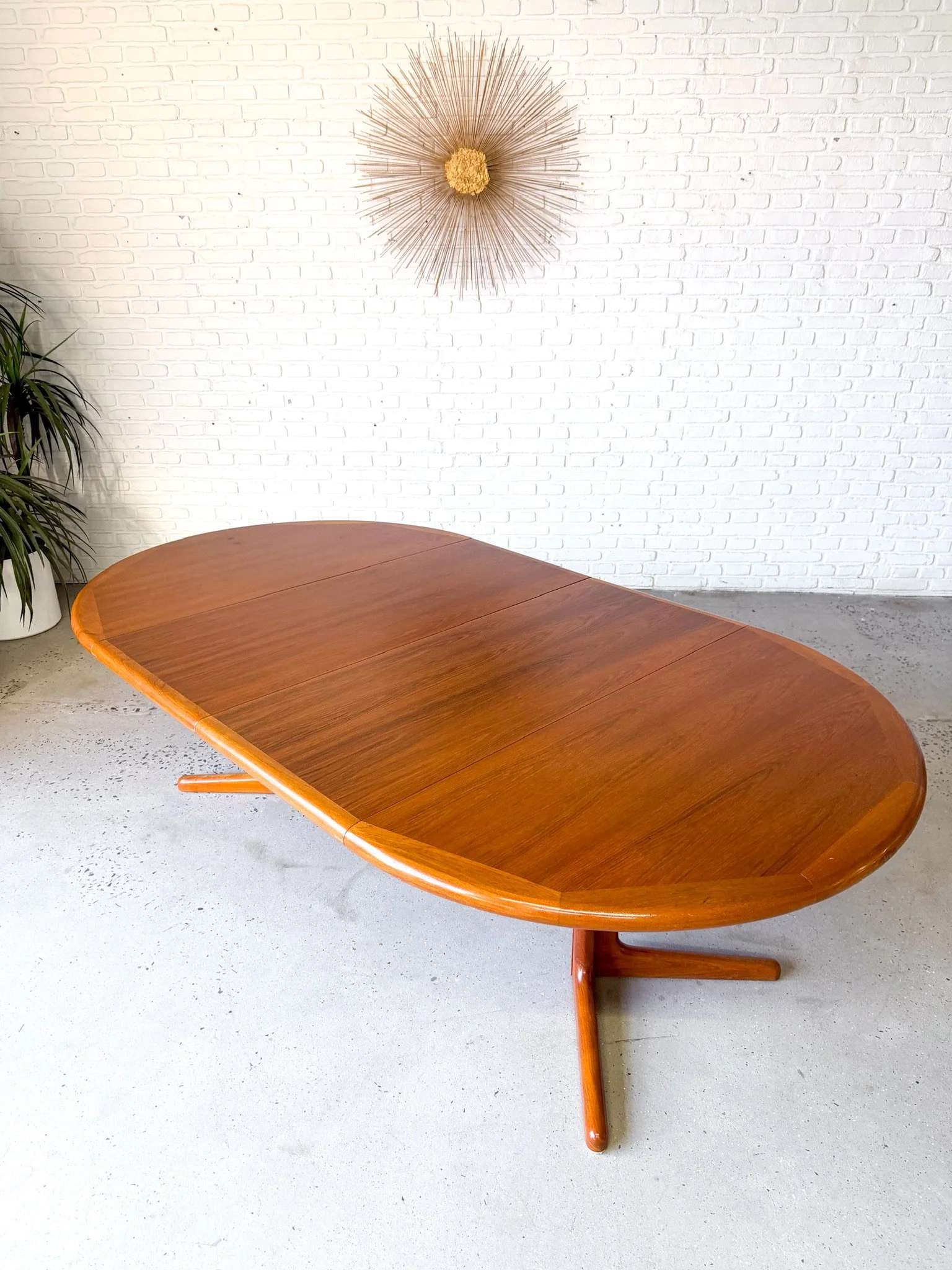 Danish teak circular dining table with two large leaves5.jpg