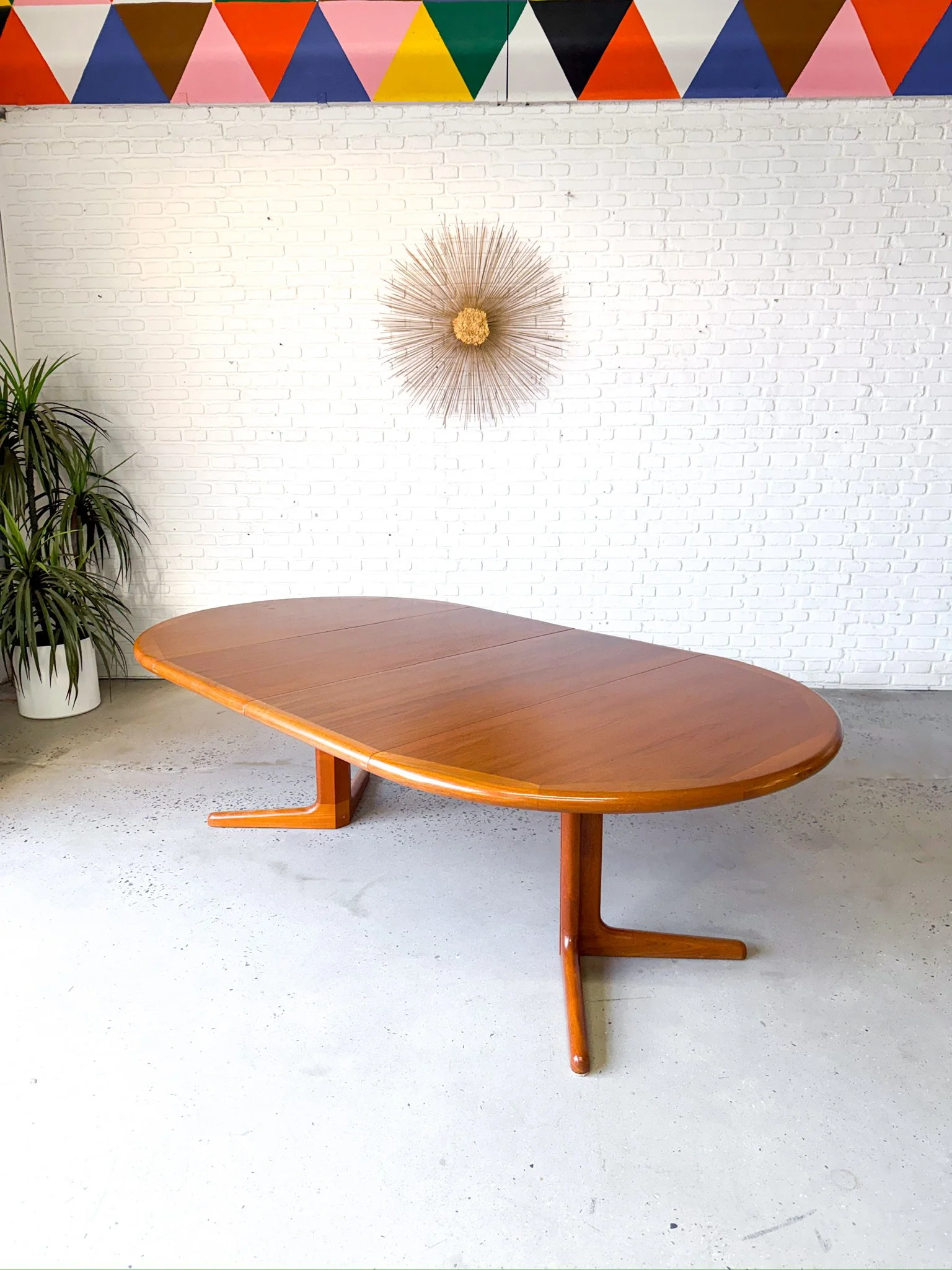 Danish teak circular dining table with two large leaves3.jpg
