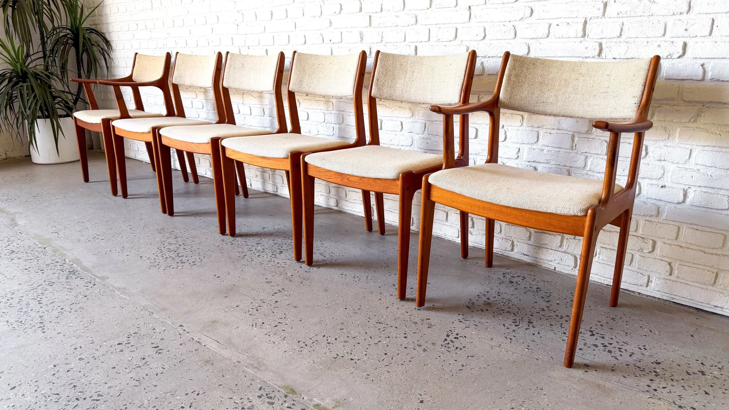 Teak dining chairs c. 1960s set of 64.jpg