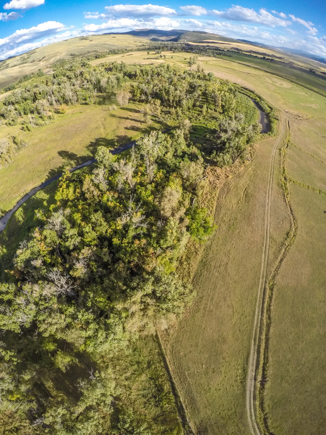 (The line between the agricultural land on the right and the conservation area on the left is as thin as the fence separating the wilderness from the pasture.)