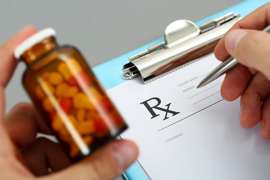 bigstock-Male-Medicine-Doctor-Hand-Hold-125326820.jpg