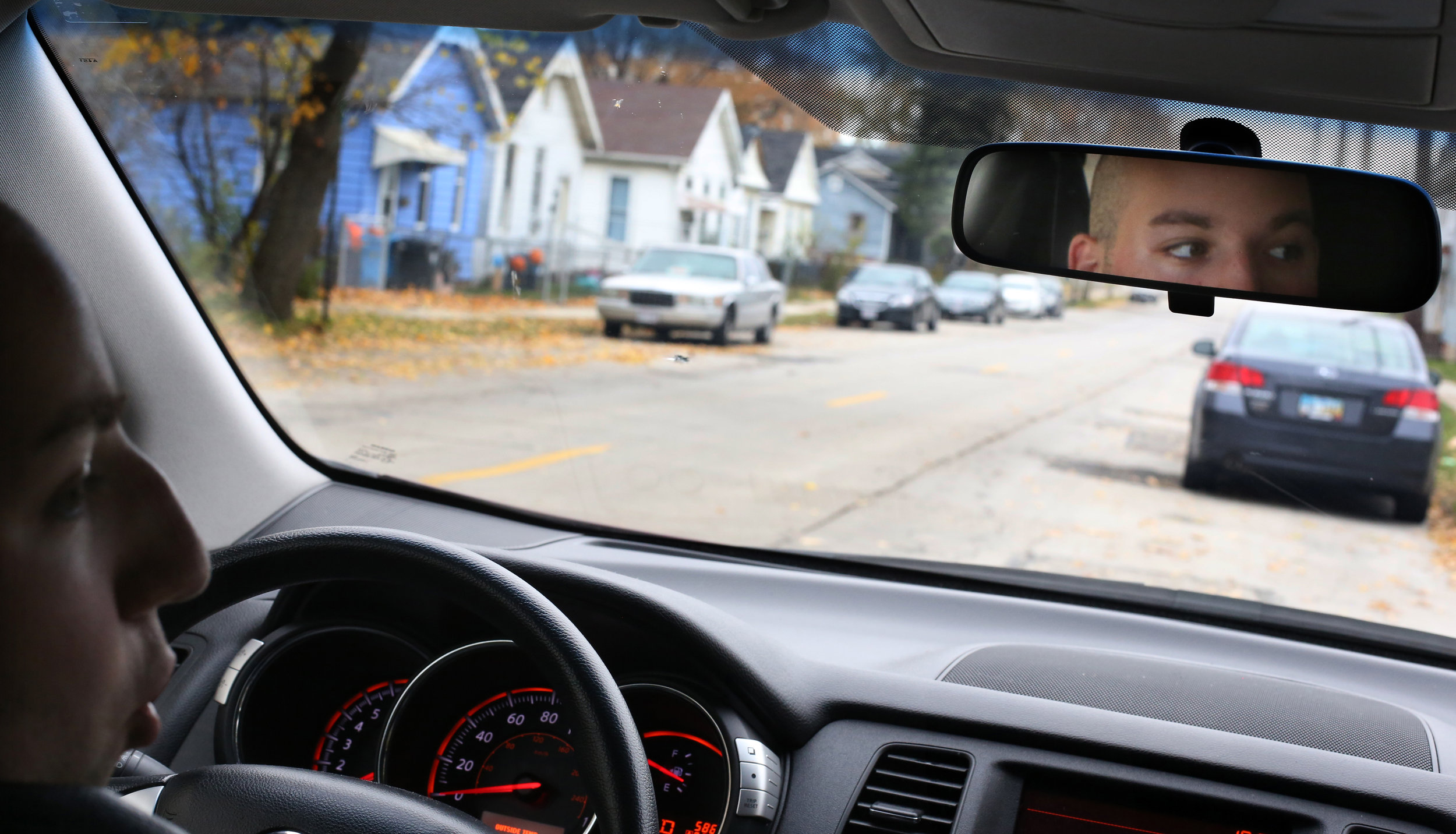  Radi Cheaib drives through Toledo's North End near the carry-out his parents own. Though he has been jumped in the neighborhood, he says he's happy to keep living there. Because his father Hassan is elderly Radi often provides transportation. 





