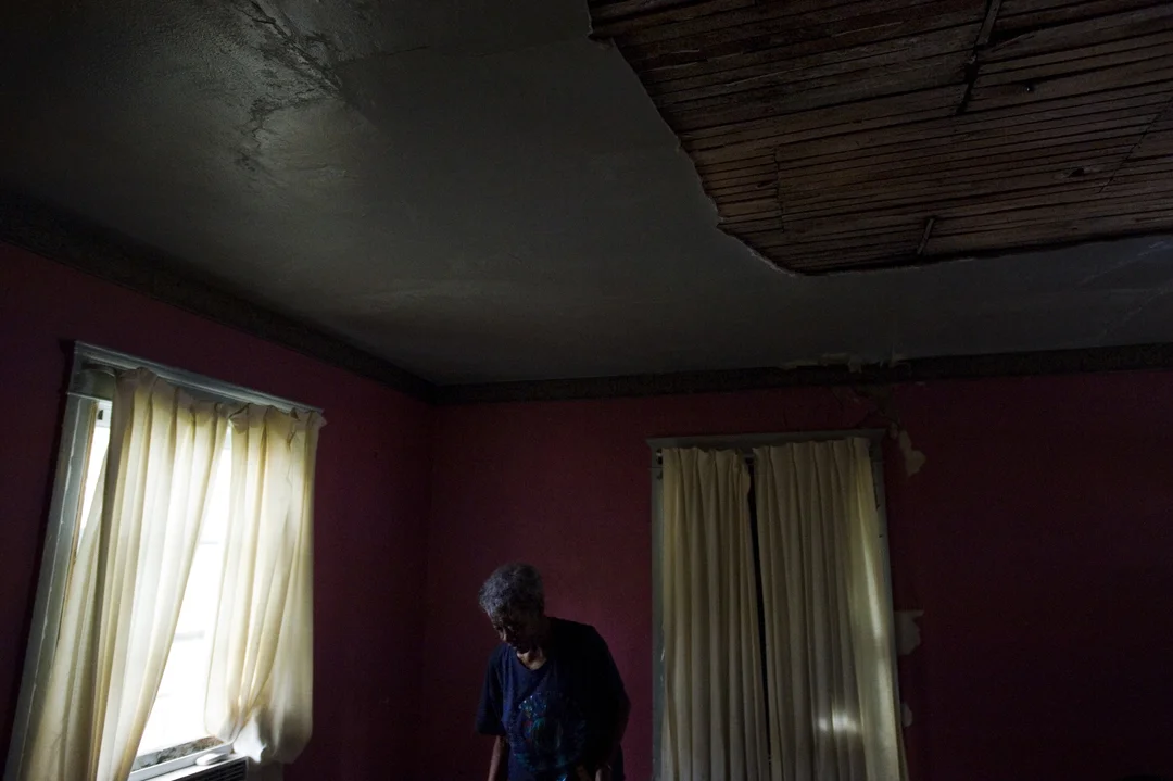  Annie Osborne sorts some of her possessions while moving out of the house she lost to tax foreclosure. After living in her home for many years Osborne found packing up to be a daunting challenge. When push came to shove she ended up having to abando