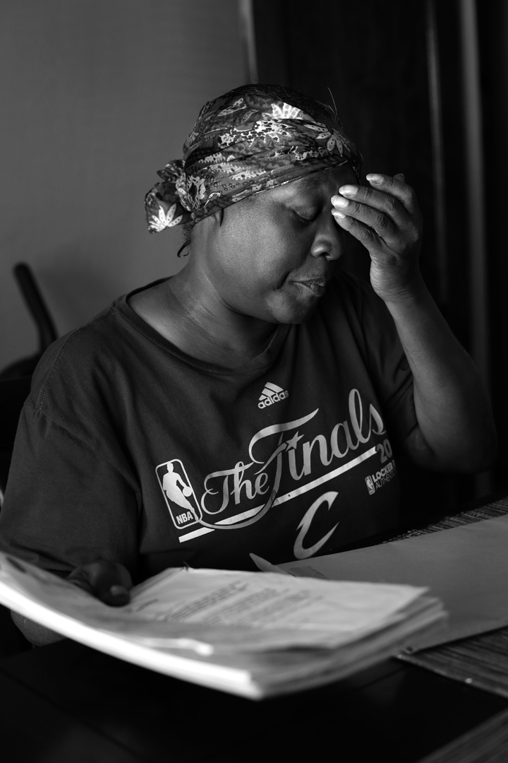  Velma Rollins has kept records of her struggle with the Cuyahoga County Board of Health. She has lived in her house off and on since childhood, and has raised children and grandchildren there. Now, her son owns the property and the pair have struggl