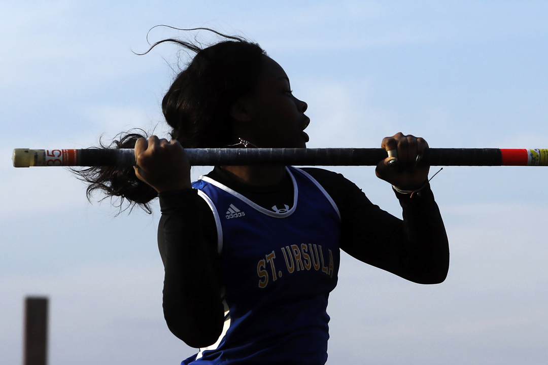 St. Ursula's April Galloway attempts nine feet, six inches in the pole vault Friday, April 27, 2018, at the Nancy Erme Relays track meet at Whitmer High School.
