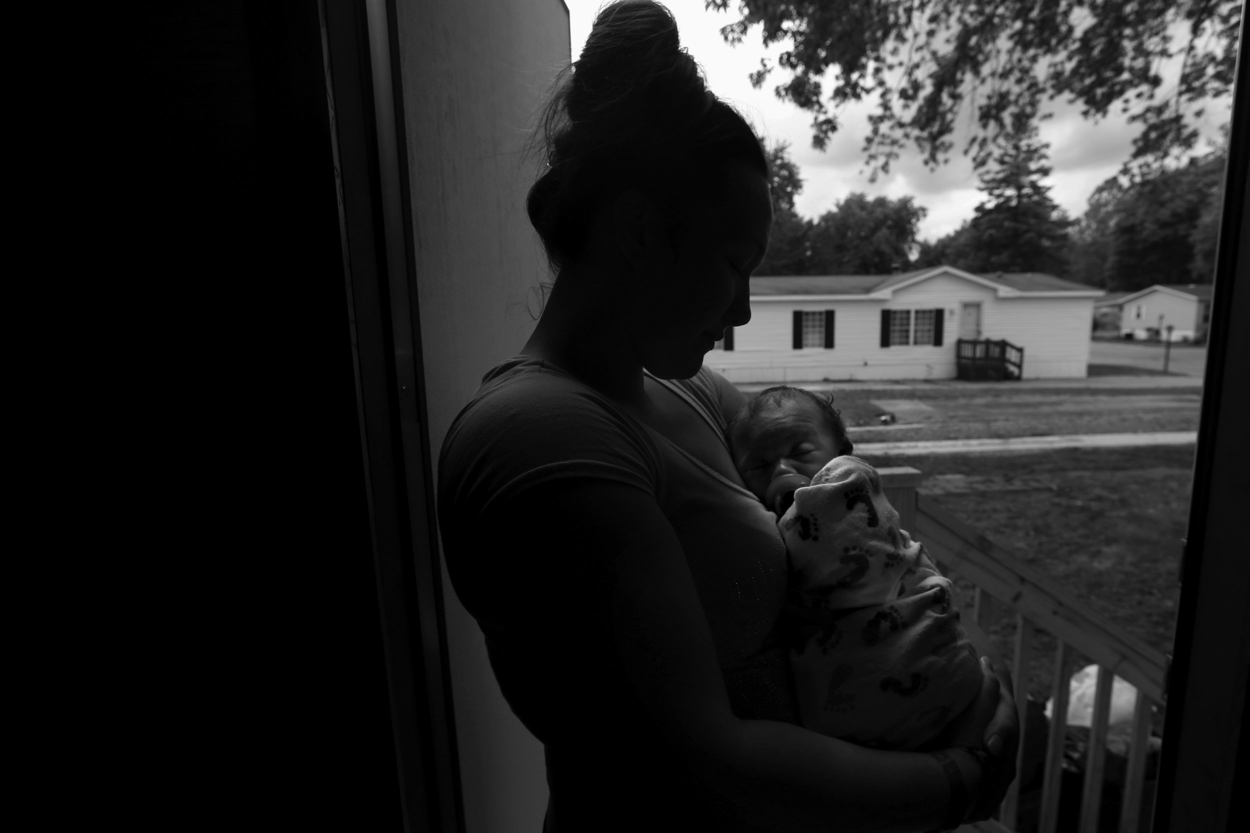  After first using heroin as a teenager and continuing for five years, a local woman, who declined to be named but agreed to be photographed, decided to get clean the day she learned she was pregnant. Now, she and her two-month-old son, pictured on J