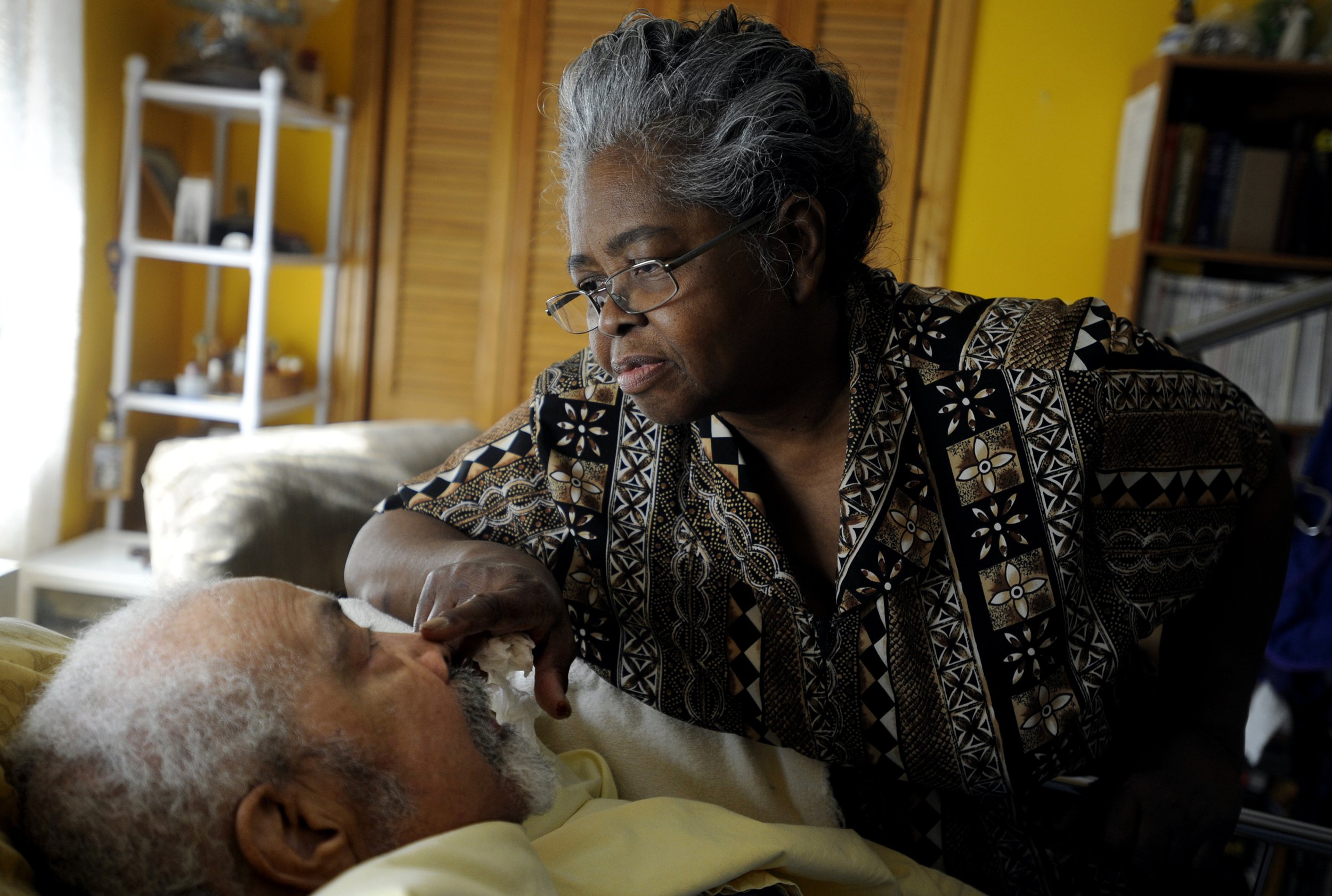  "He's not like he was, but I roll with the punches. You got to enjoy the time you have left," Jean Alexander said after checking on her husband, Carl, in their bedroom. Jean has been caring for Carl, who has Parkinson's related dementia and diabetes