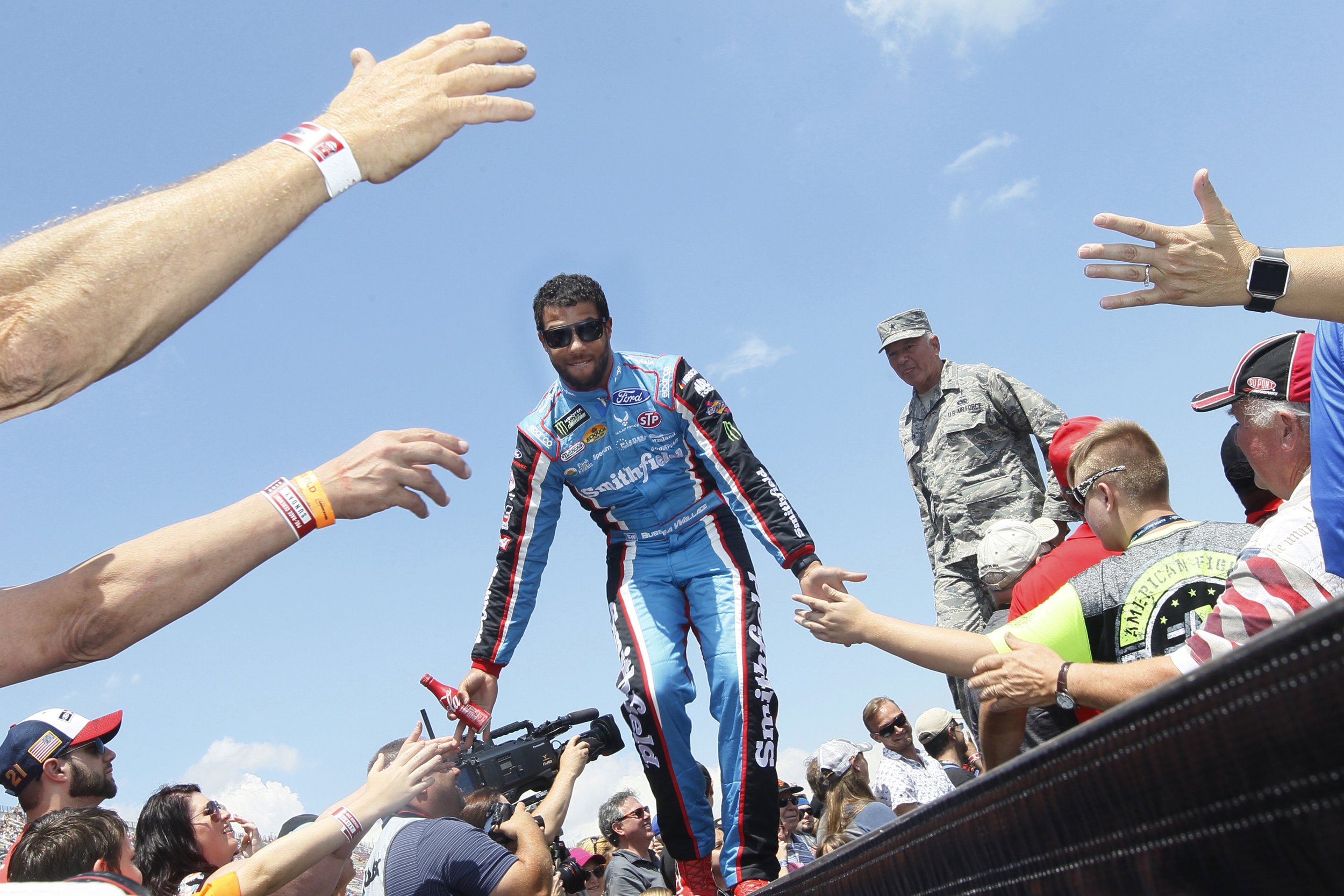  Driver Darrell Wallace, Jr. greets fans before the 49th Annual FireKeepers Casino 400 race at Michigan International Speedway in Brooklyn, Mich., on Sunday, June 18, 2017.  Thousands of fans turned out for the first of the speedway’s two annual NASC