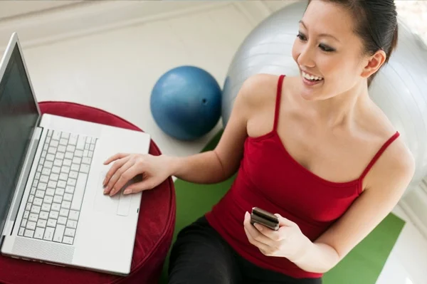 woman-exercising-near-computer.jpg