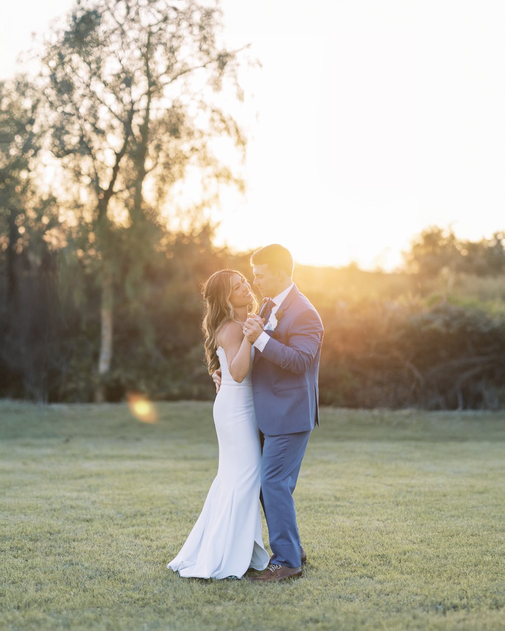 bride-and-groom-dancing-at-sunset.jpg