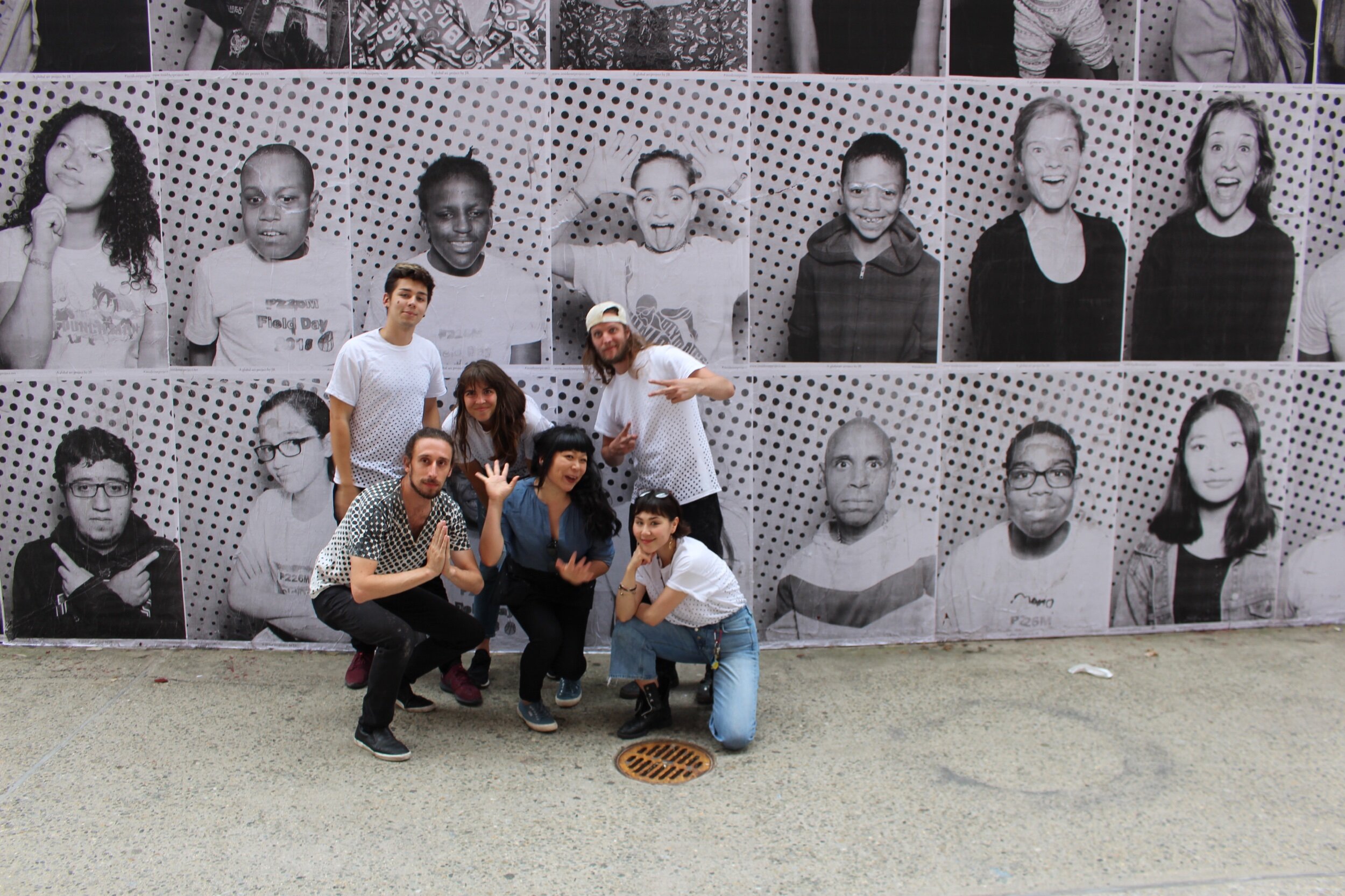 Team photo from JR’s ‘Inside Out’ Project installation at the Manhattan International High School with head teacher and school organizer, Jane Lawrence 