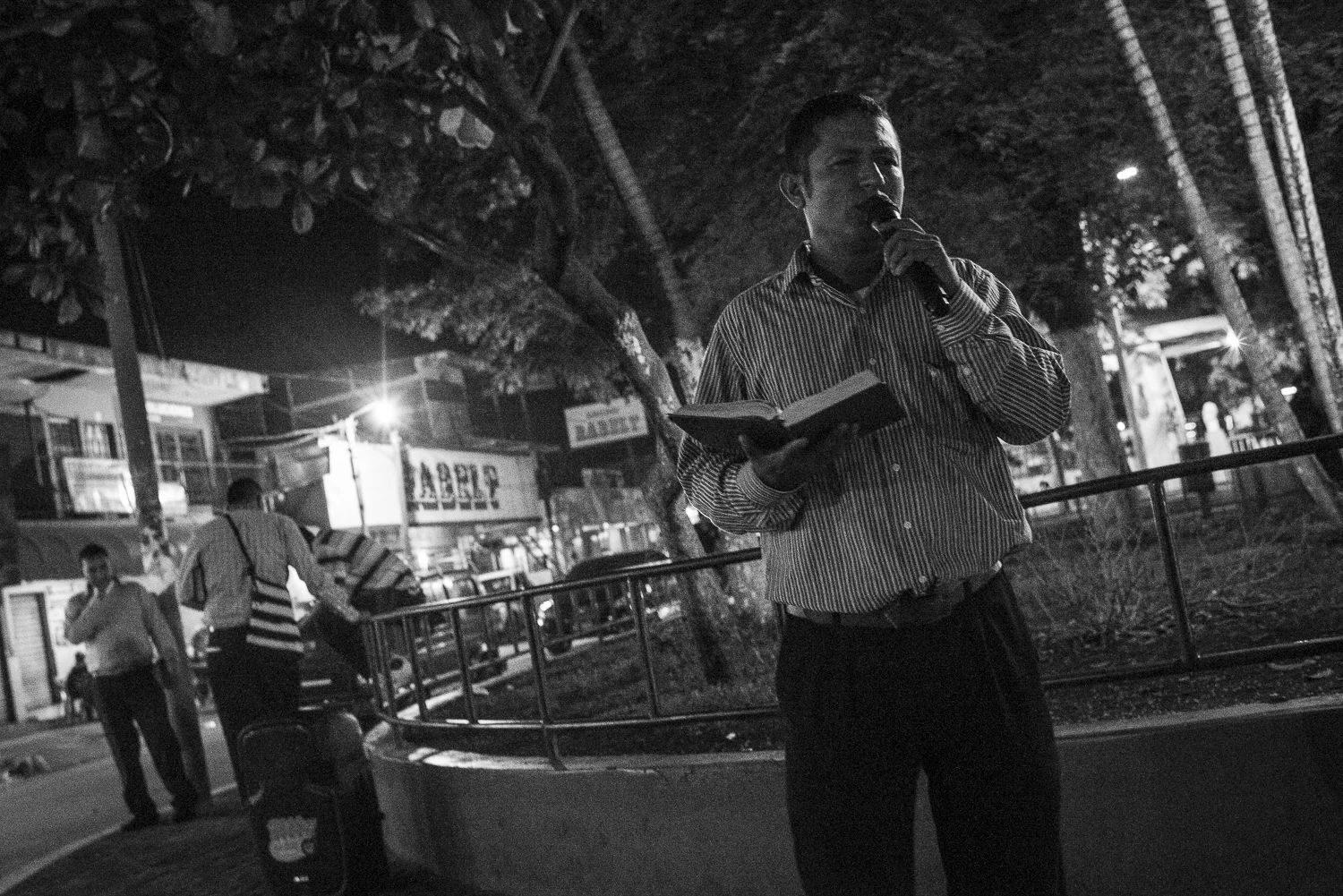 Angel is preaching in a public park at Aguilares. (April 14, 2018) Credit: Nadège Mazars / Hans Lucas studio
