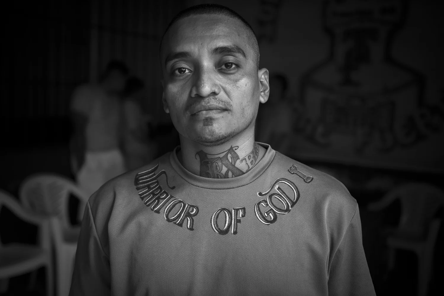 The assistant of the general pastor wears a sweat-shirt with the writing "warrior of God”. The prisonners and former gang members, consider themself as an army of God. (San Francisco de Gotera, El Salvador, April 19, 2018) Credit: Nadège Mazars / Hans Lucas studio