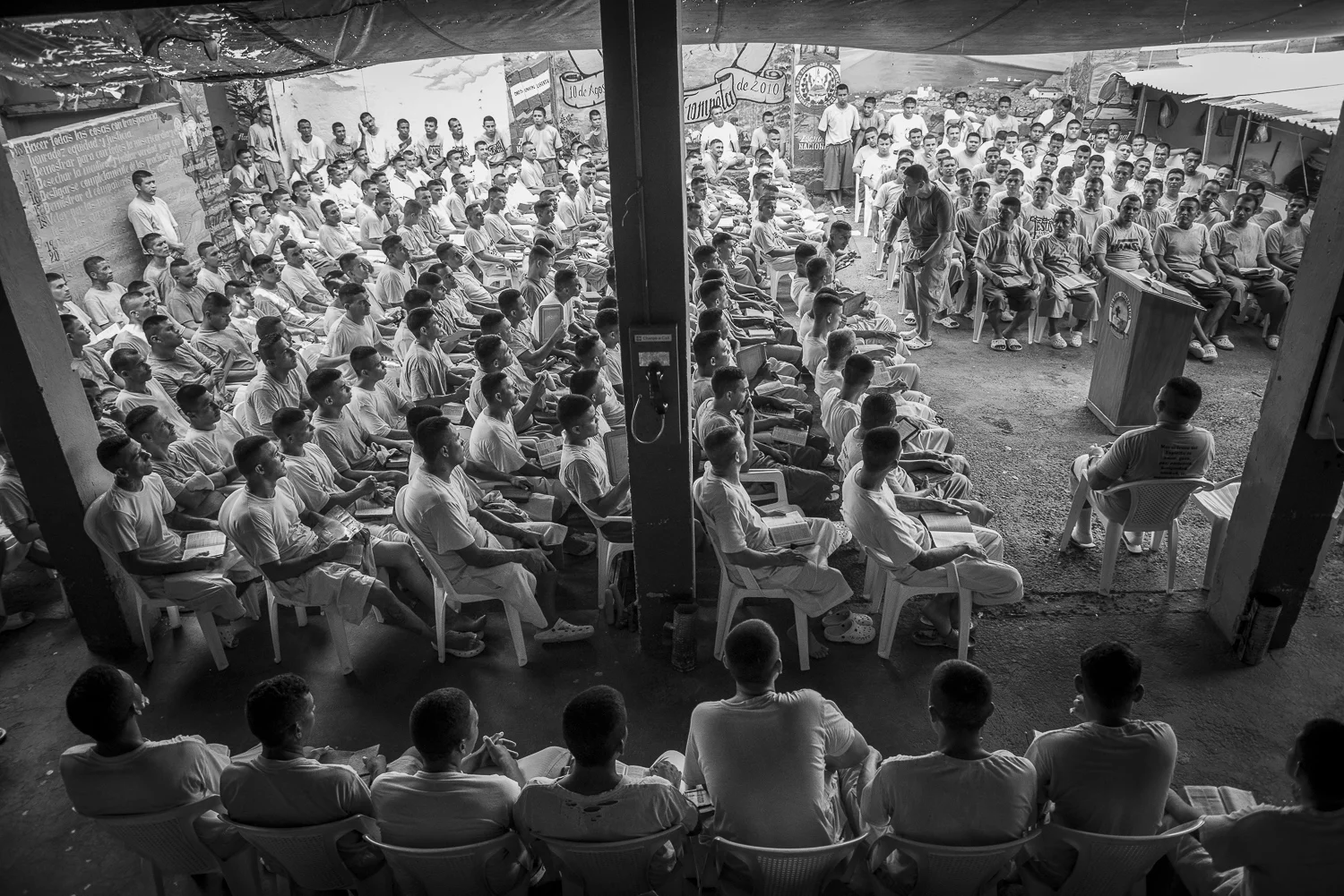 The yards 4, 5 and 6 of the jail, the inmates, are gattered to realize the worship of the Final Trumpet church. The Church was created in 2010 inside the jail. (San Francisco de Gotera, El Salvador, April 19, 2018). Credit: Nadège Mazars / Hans Lucas studio