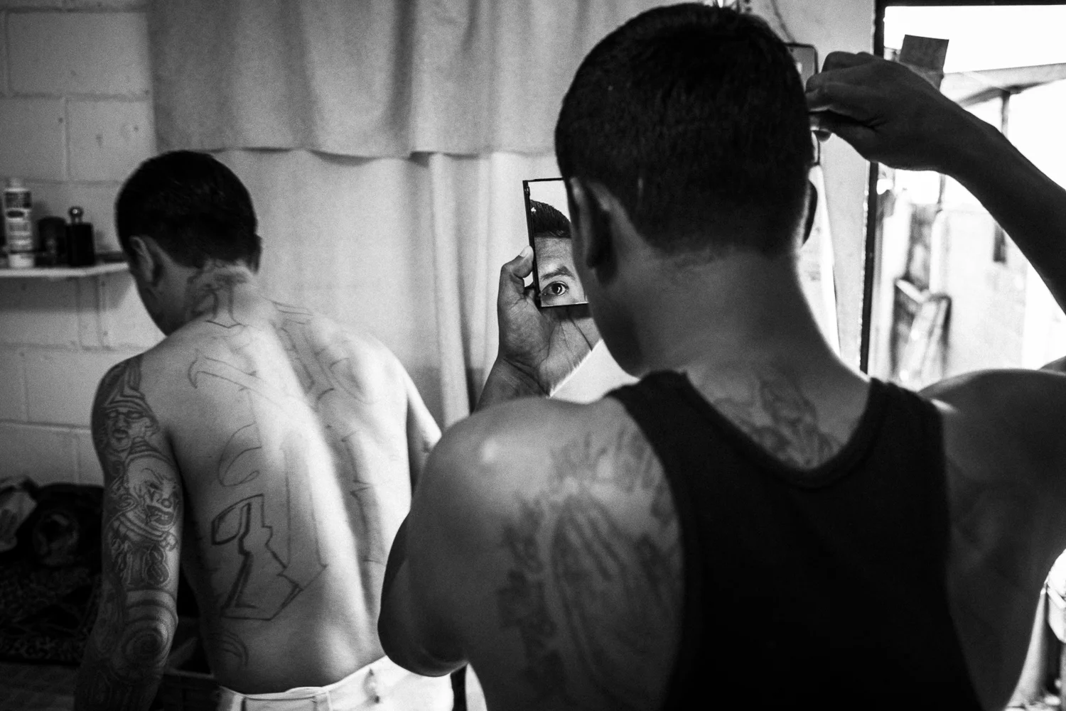 At the Eber Ezer Church, Marvin prepares himself before received with the other former gang members of the Eber Ezer church a peace construction diploma that certifies his participation to the program and his commitment to change. (Colonia Dina, San Salvador, June 30, 2017) Credit: Nadège Mazars / Hans Lucas studio