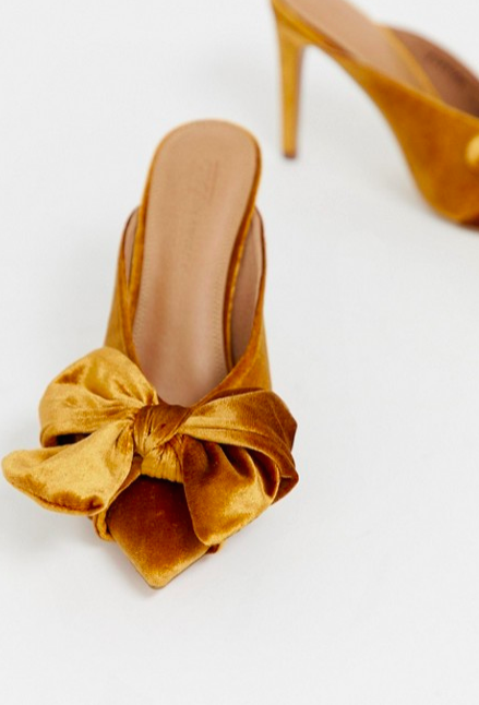 Poppy pointed high heel mules with bow, $56