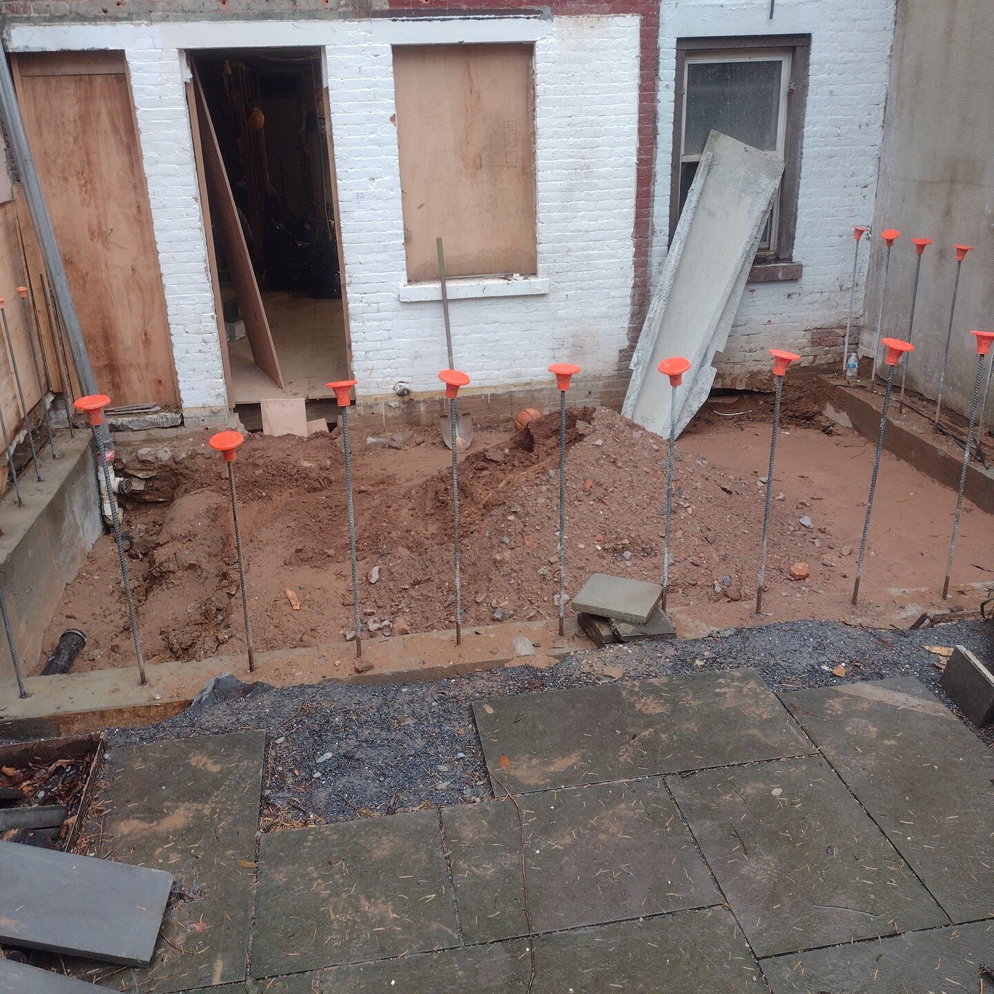 All I want for Christmas is a lower cellar and a rear extension. Project in progress - it will look really good in a few months but for now it's in a slow and not very glamorous phase. The concrete &quot;benches&quot; at the cellar perimeter allow us